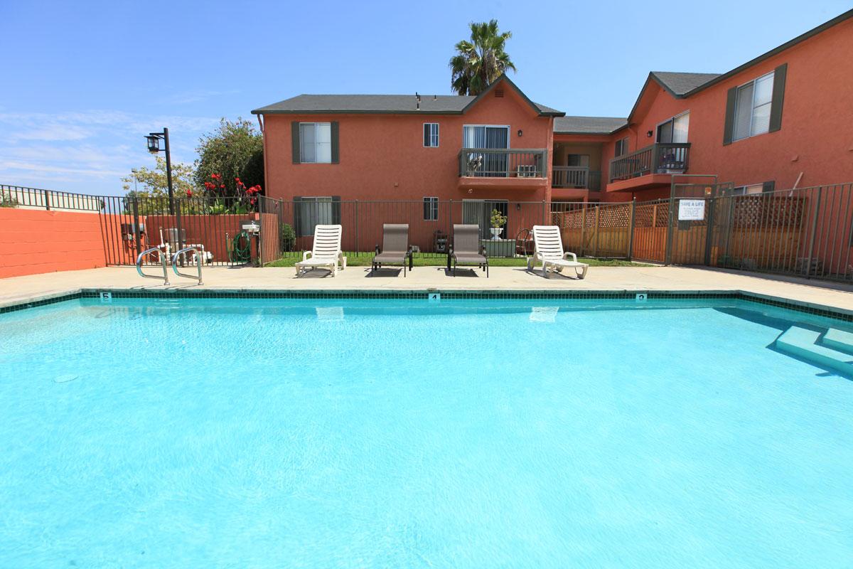 a house with a large pool of water