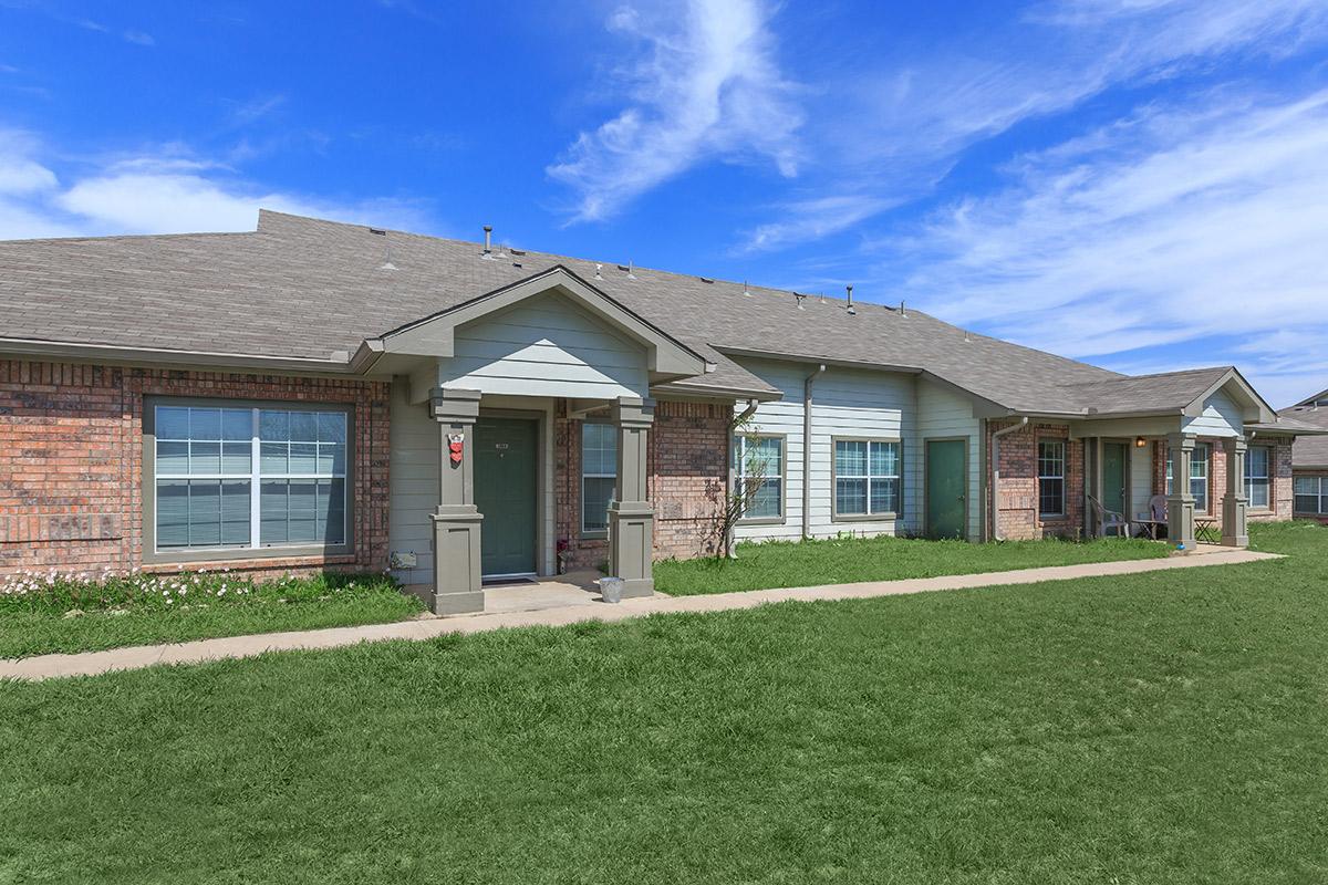 a large lawn in front of a house