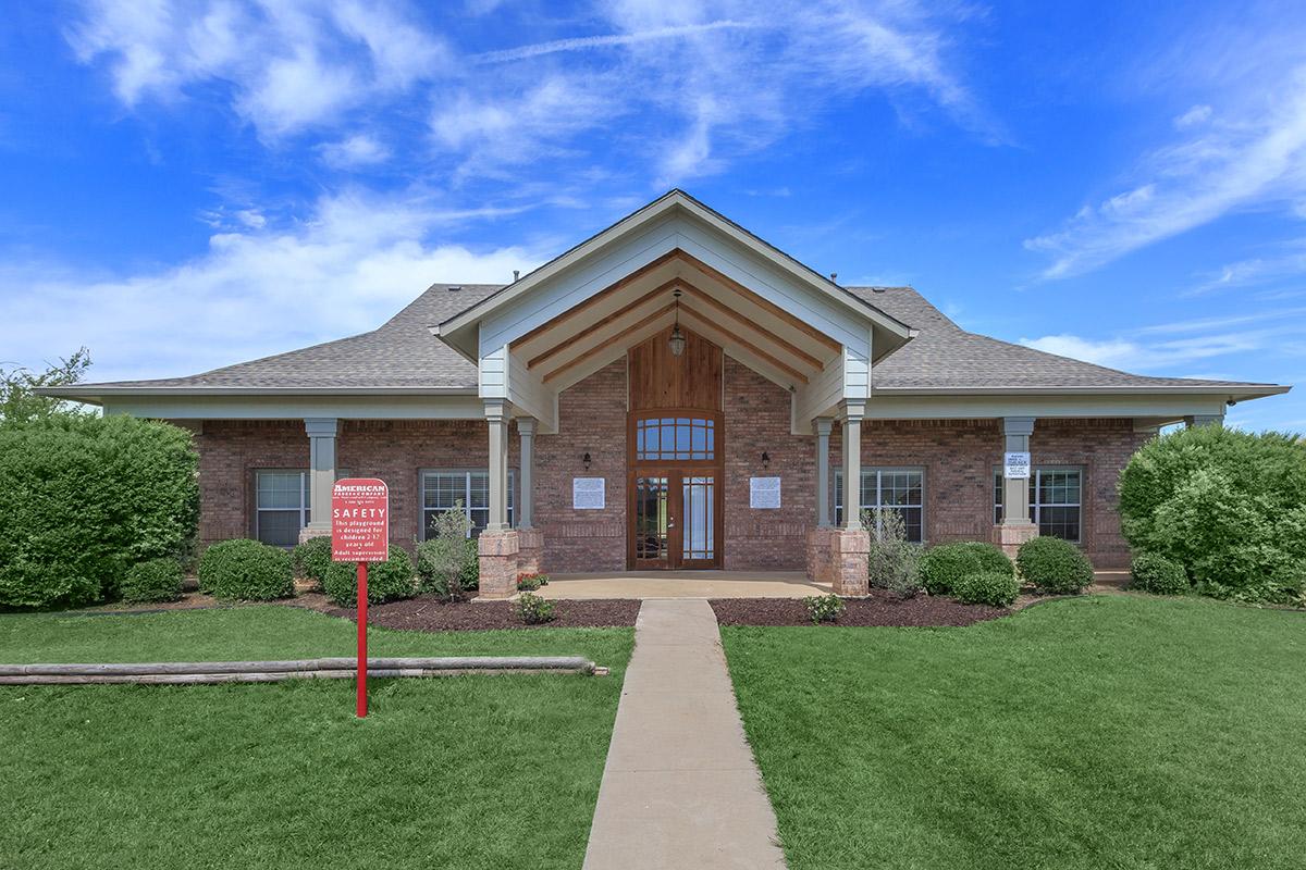 a large lawn in front of a house