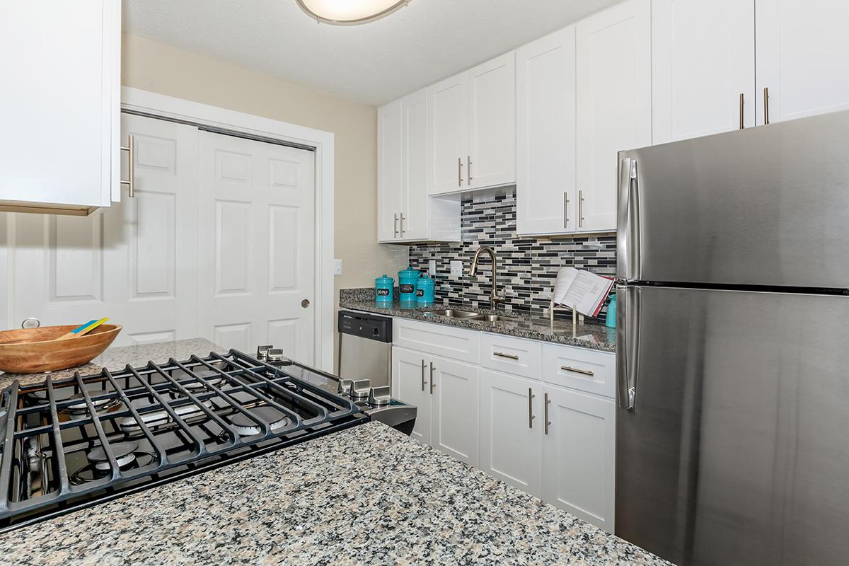 a kitchen with stainless steel appliances