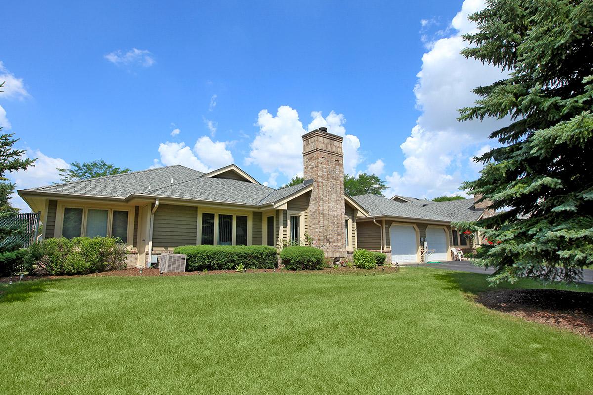 a large lawn in front of a house