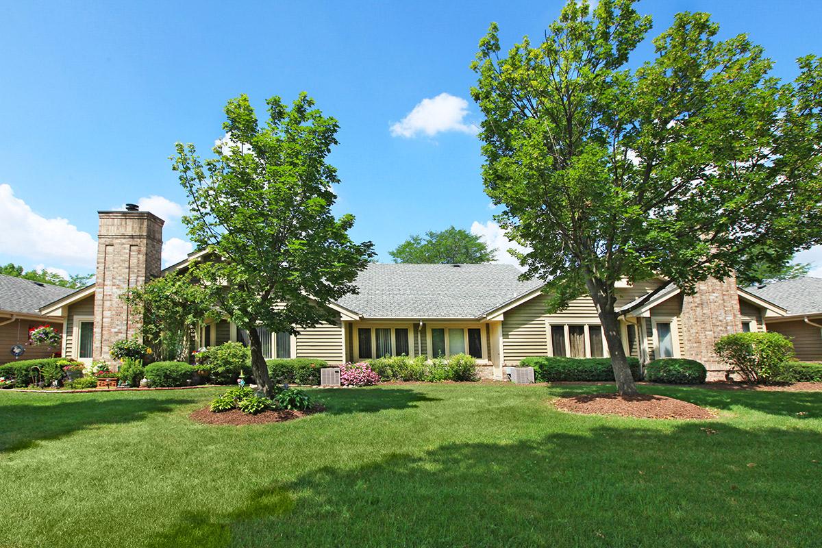 a large lawn in front of a house