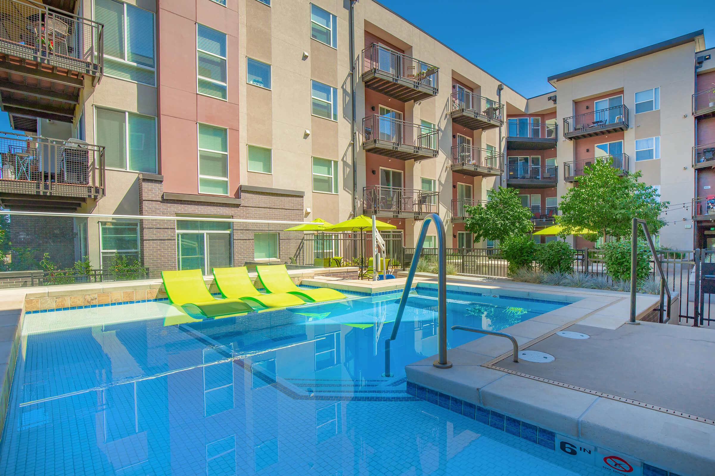 a pool next to a building