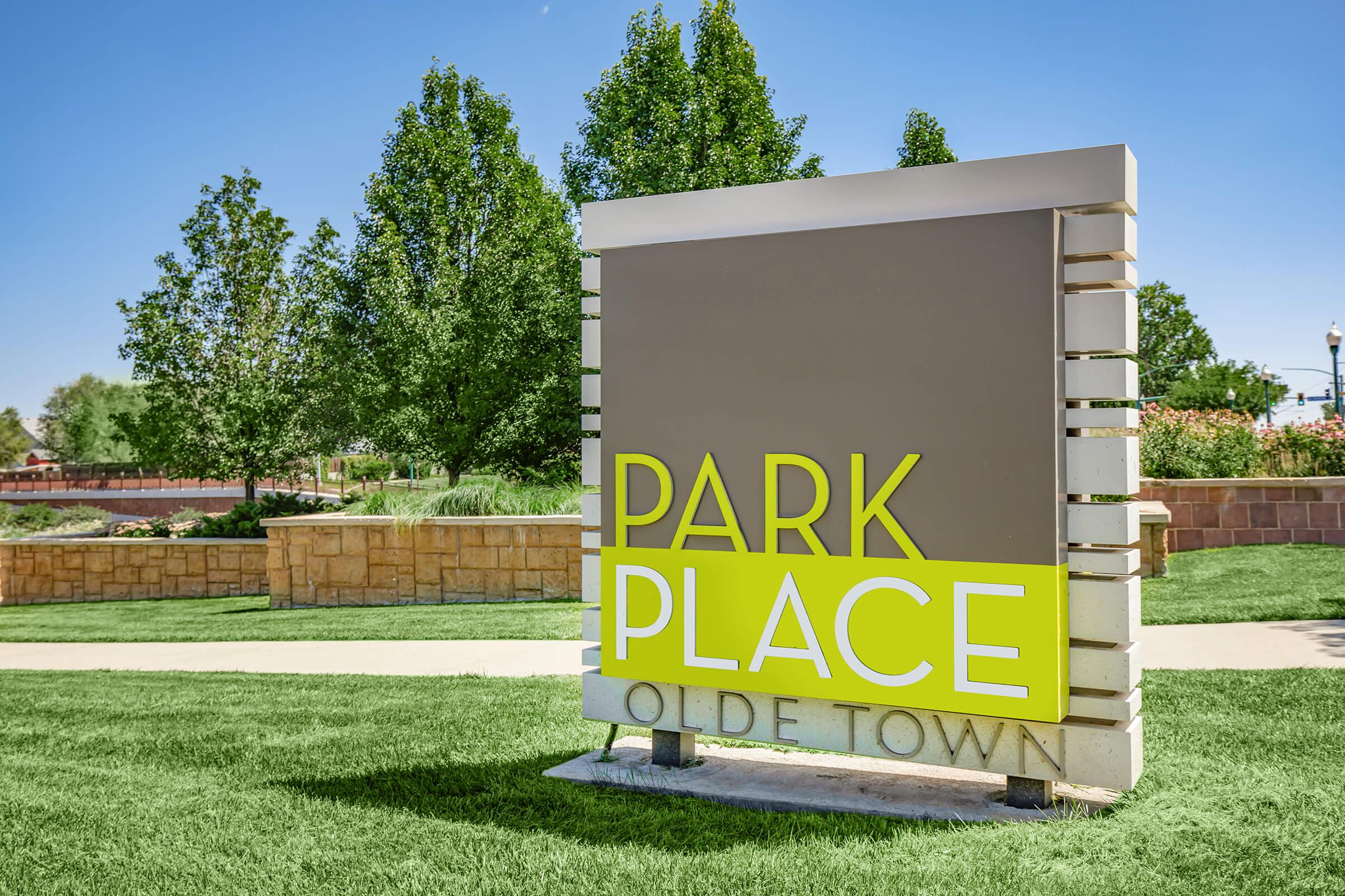 a sign in front of a house