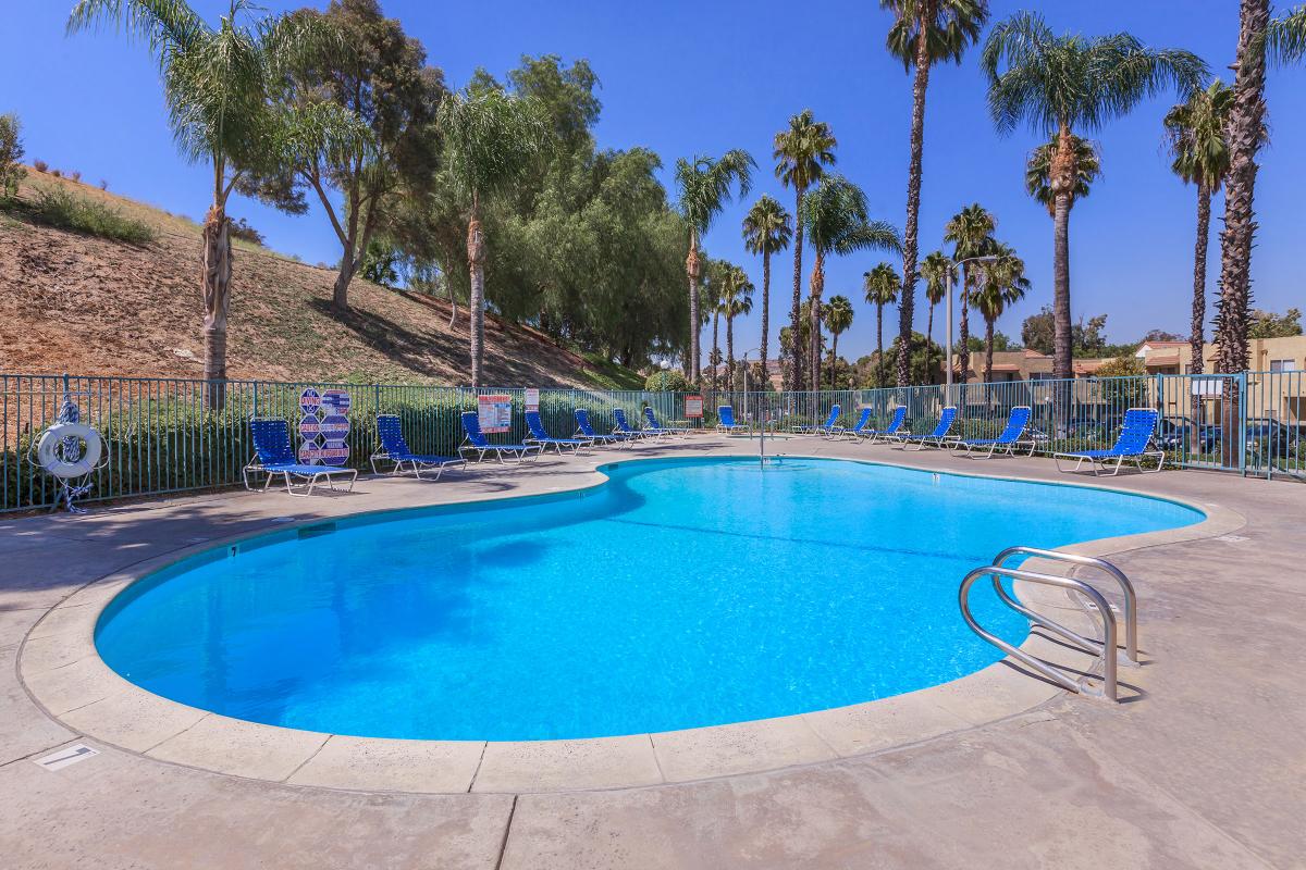 a pool next to a body of water