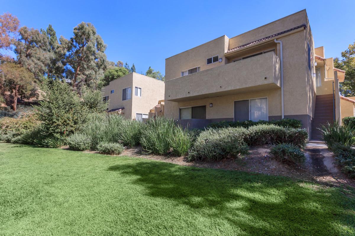 a large lawn in front of a house