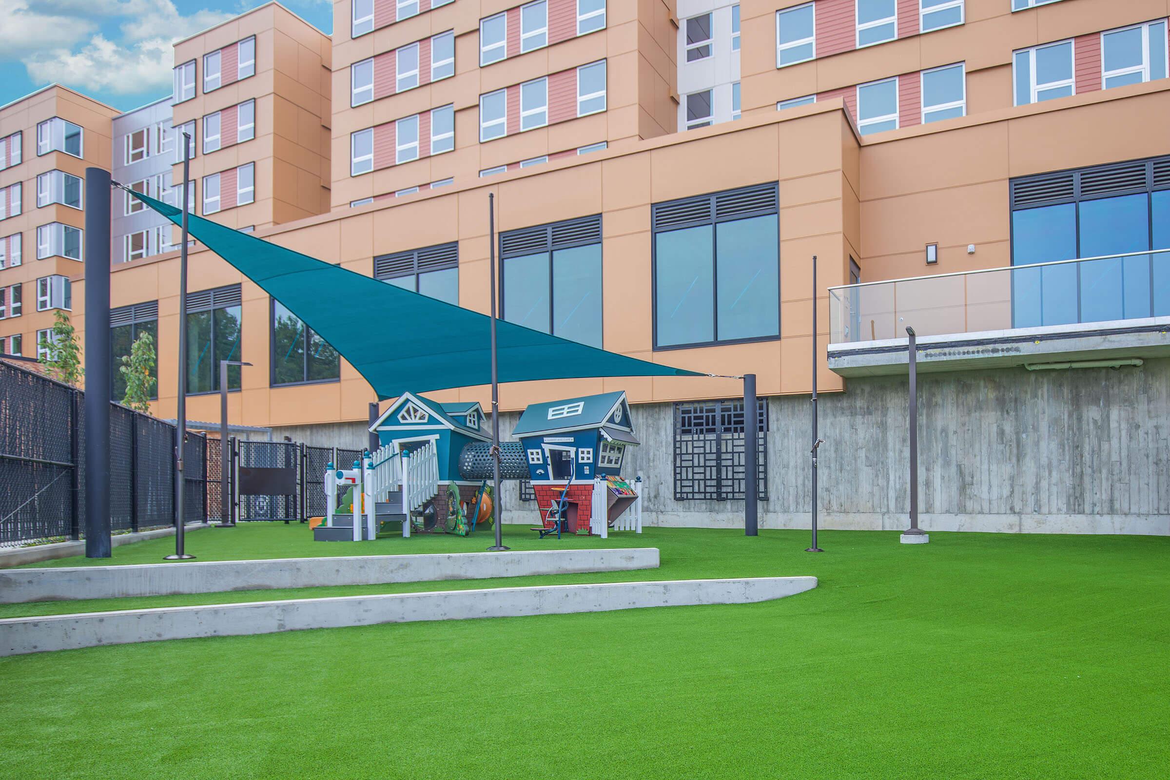 a large lawn in front of a building