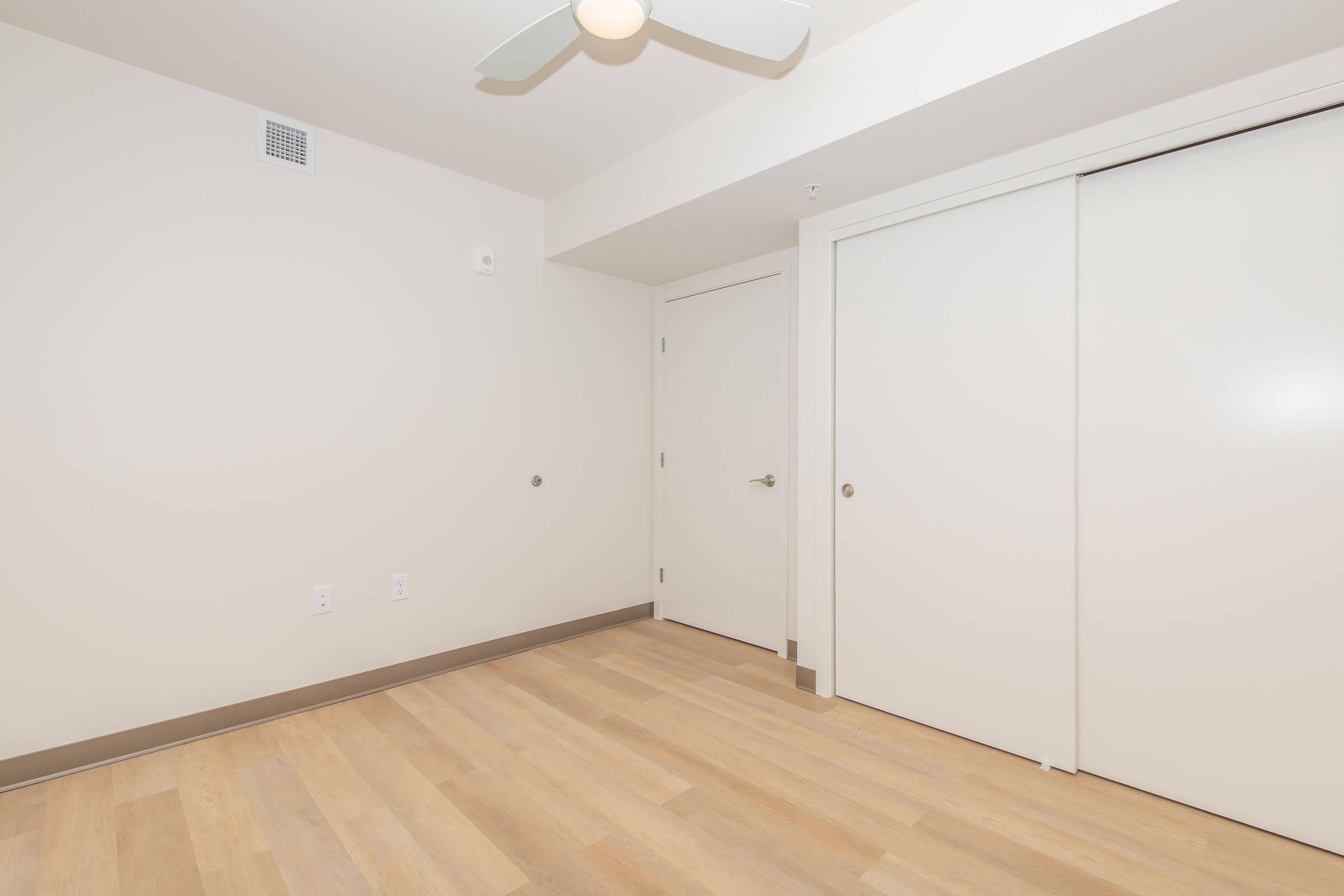 a kitchen with a wooden floor