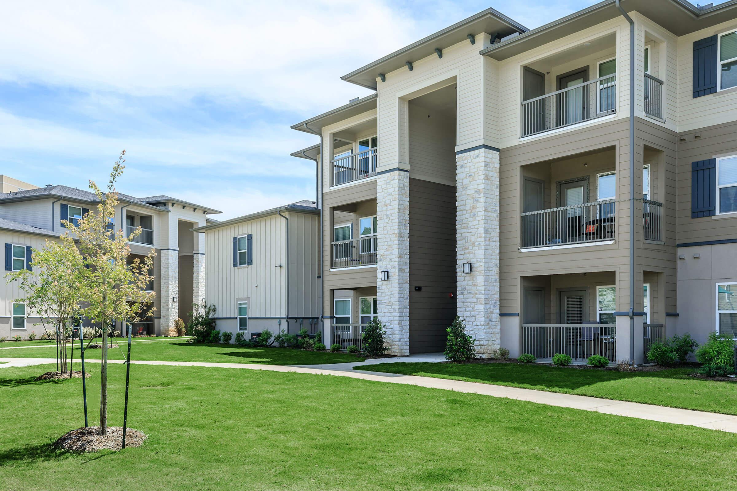 a large lawn in front of a house