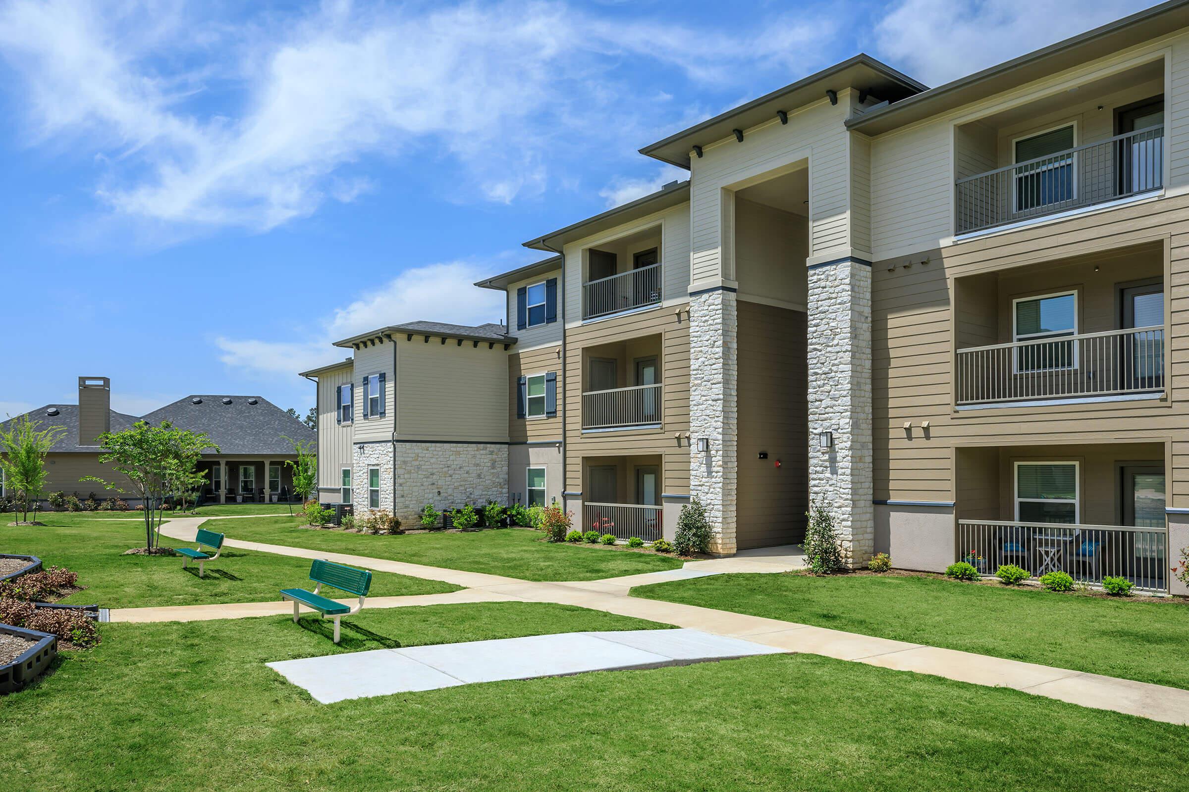 a large lawn in front of a house