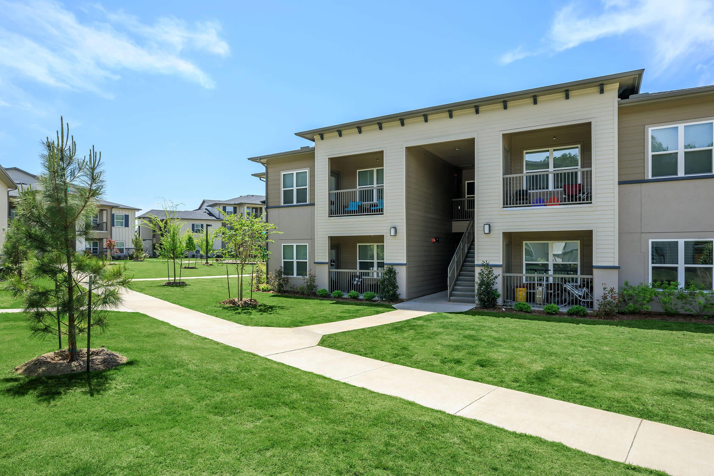 a large lawn in front of a house