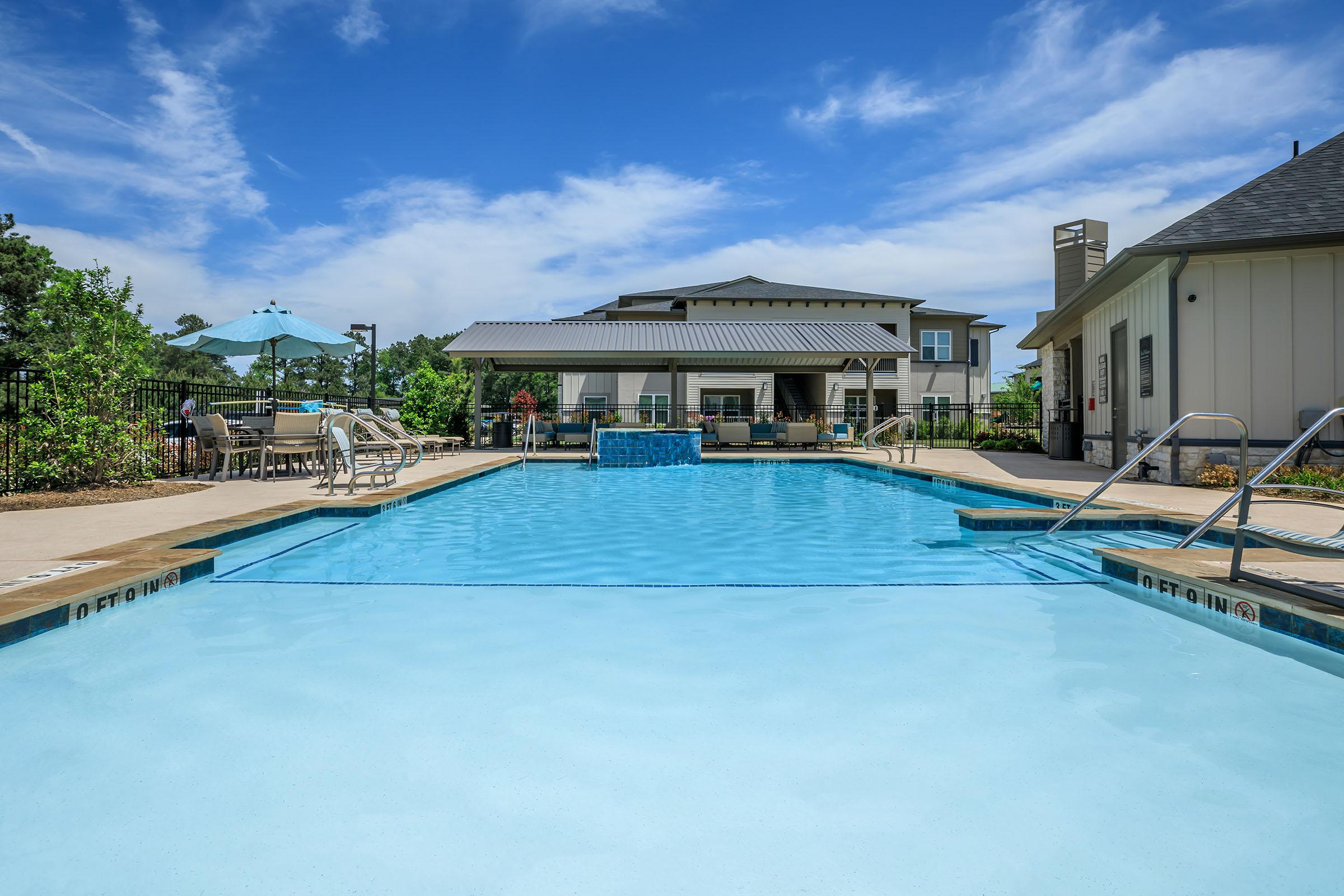 a house with a pool of water