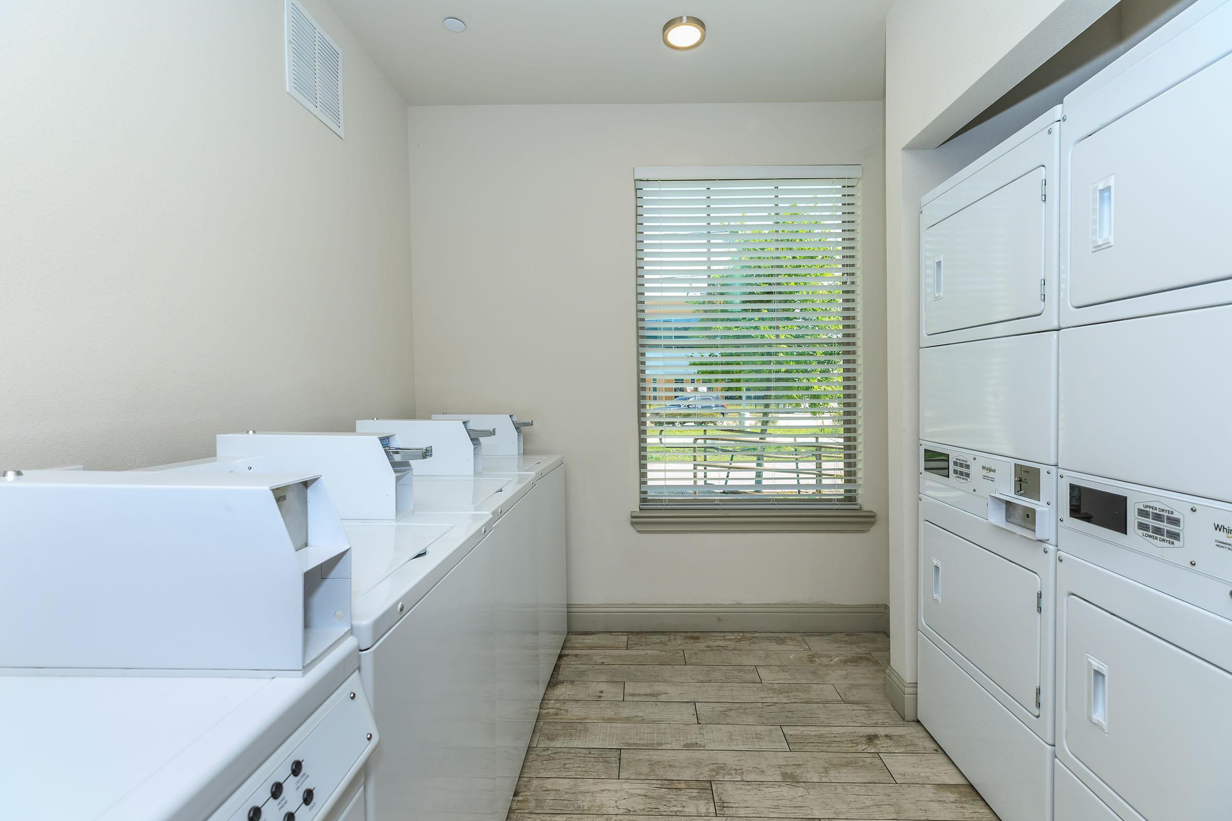 a kitchen with a sink and a window