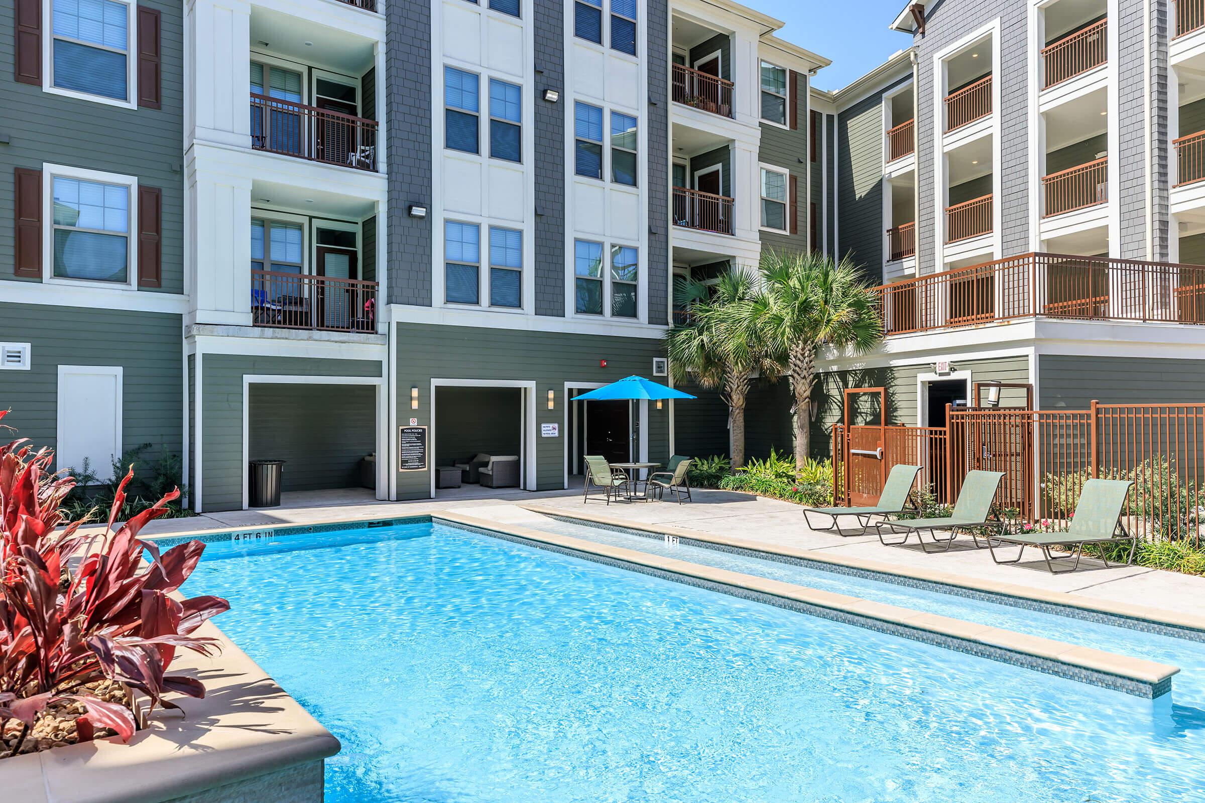 a pool next to a building