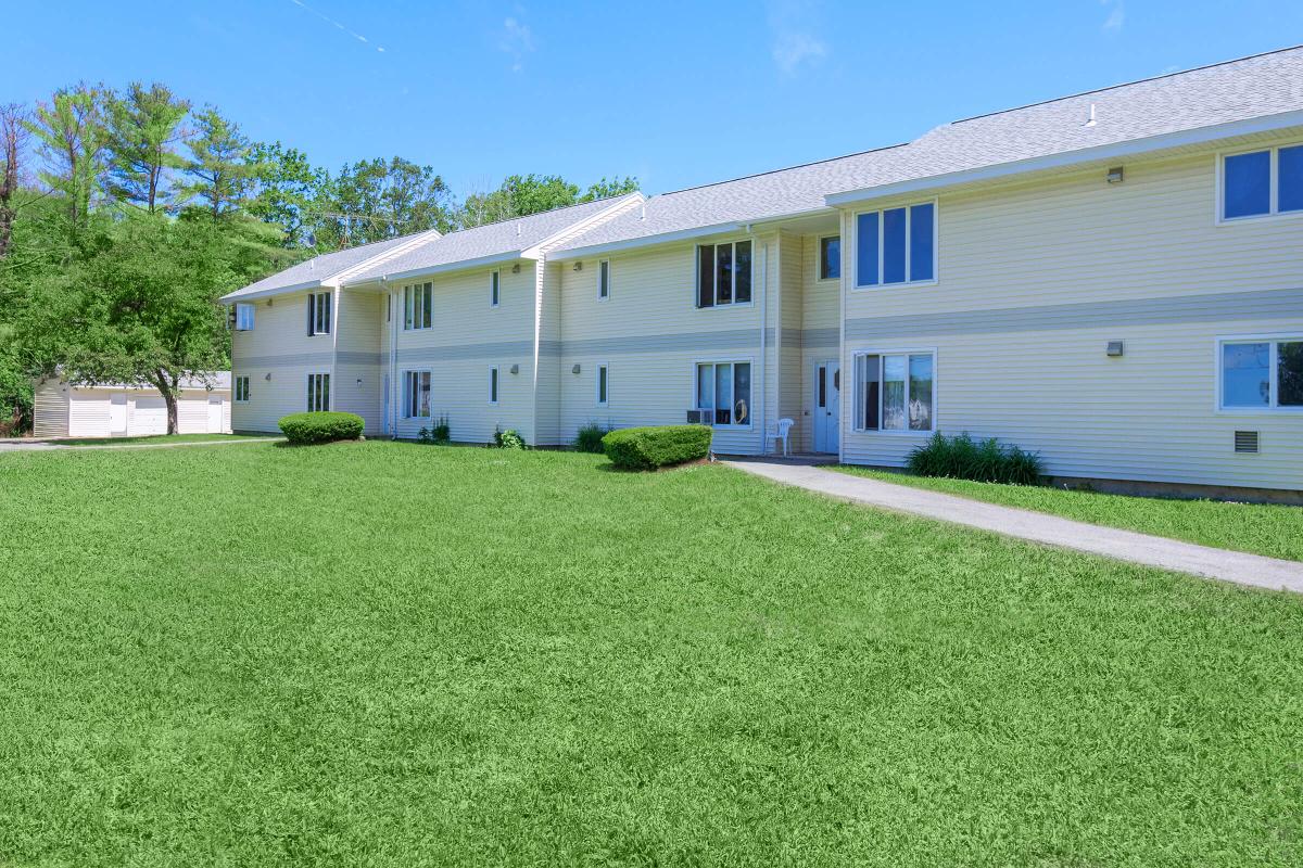 a large lawn in front of a house