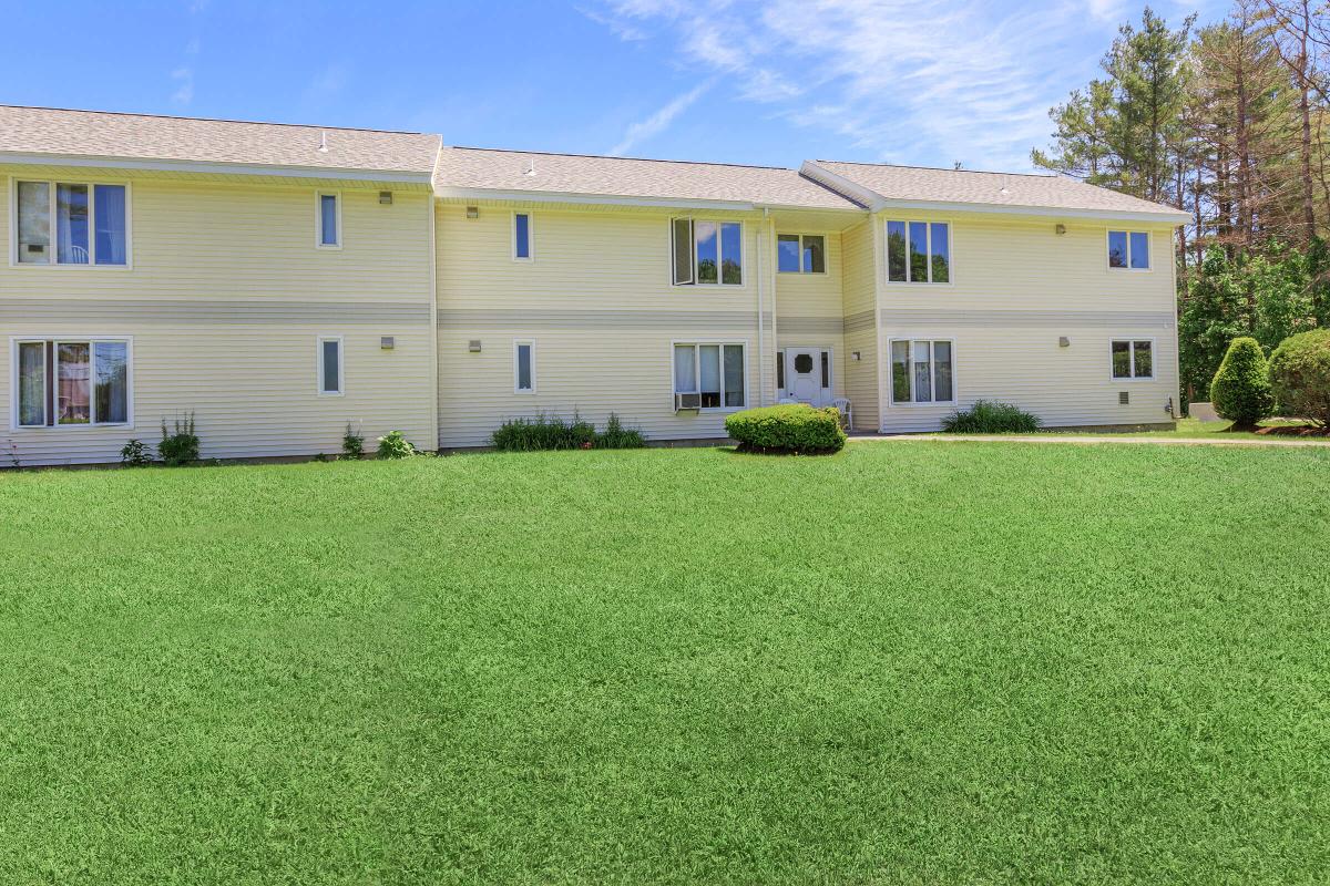 a large lawn in front of a house