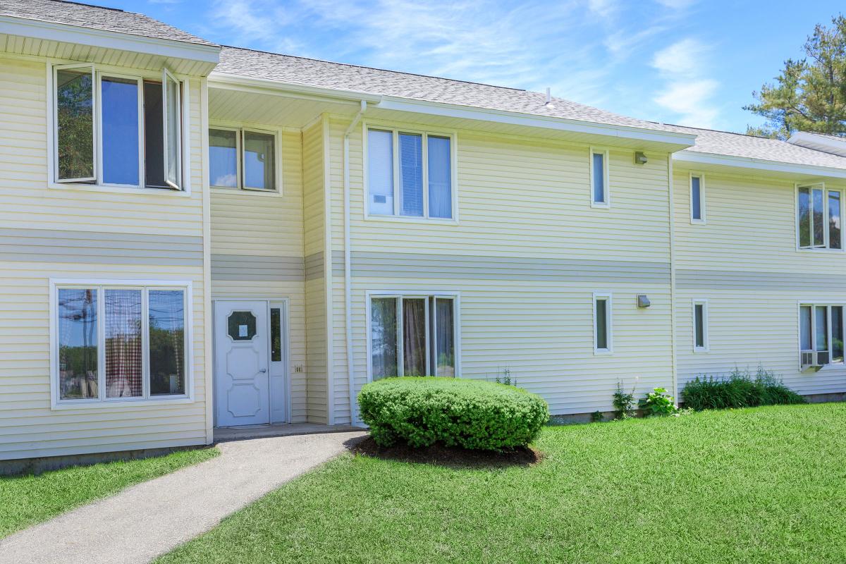 a large lawn in front of a house