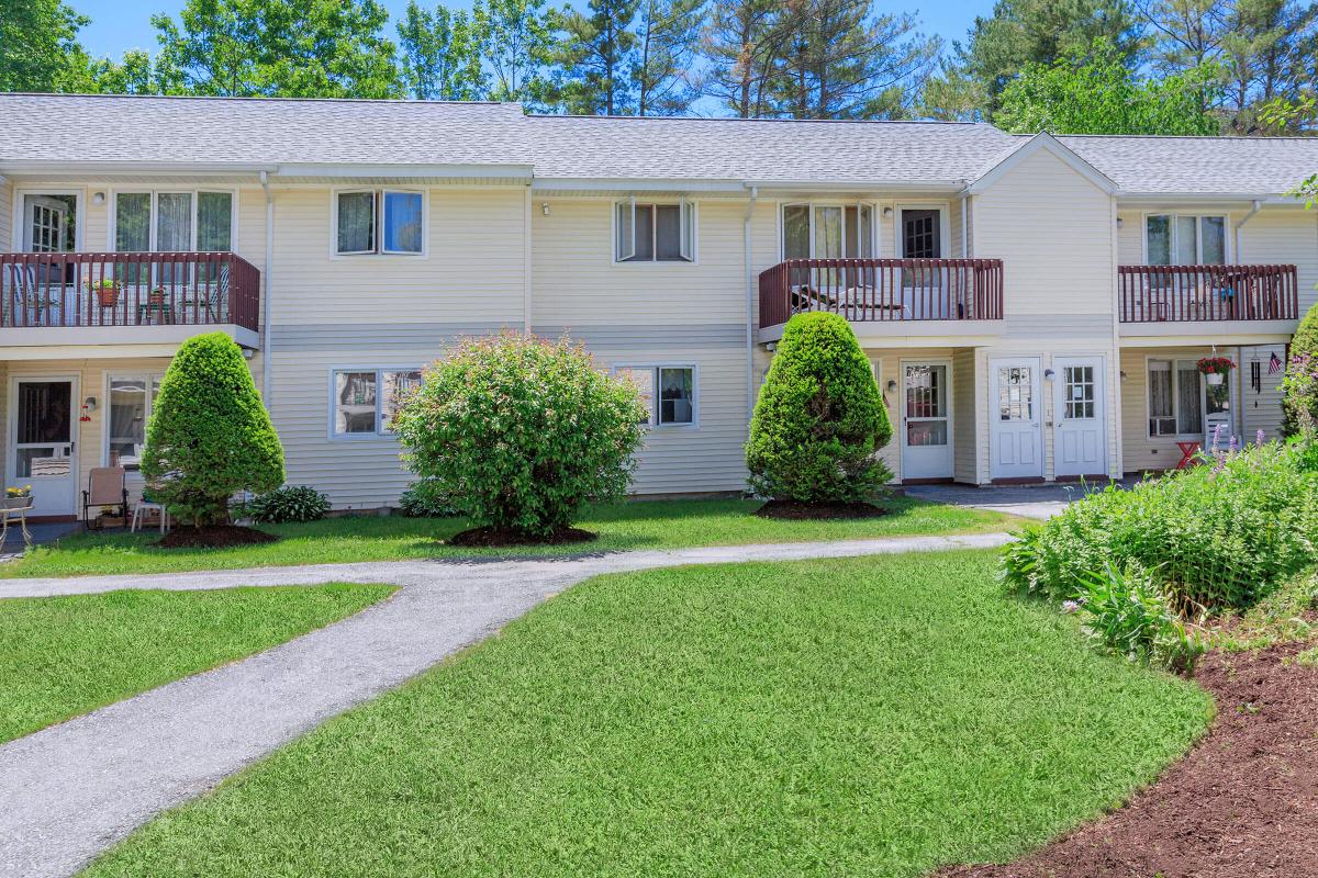 a large lawn in front of a house