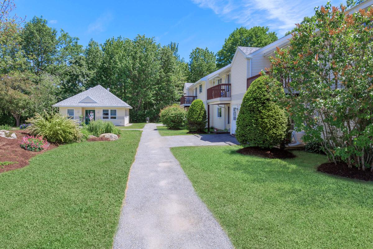 a large lawn in front of a house