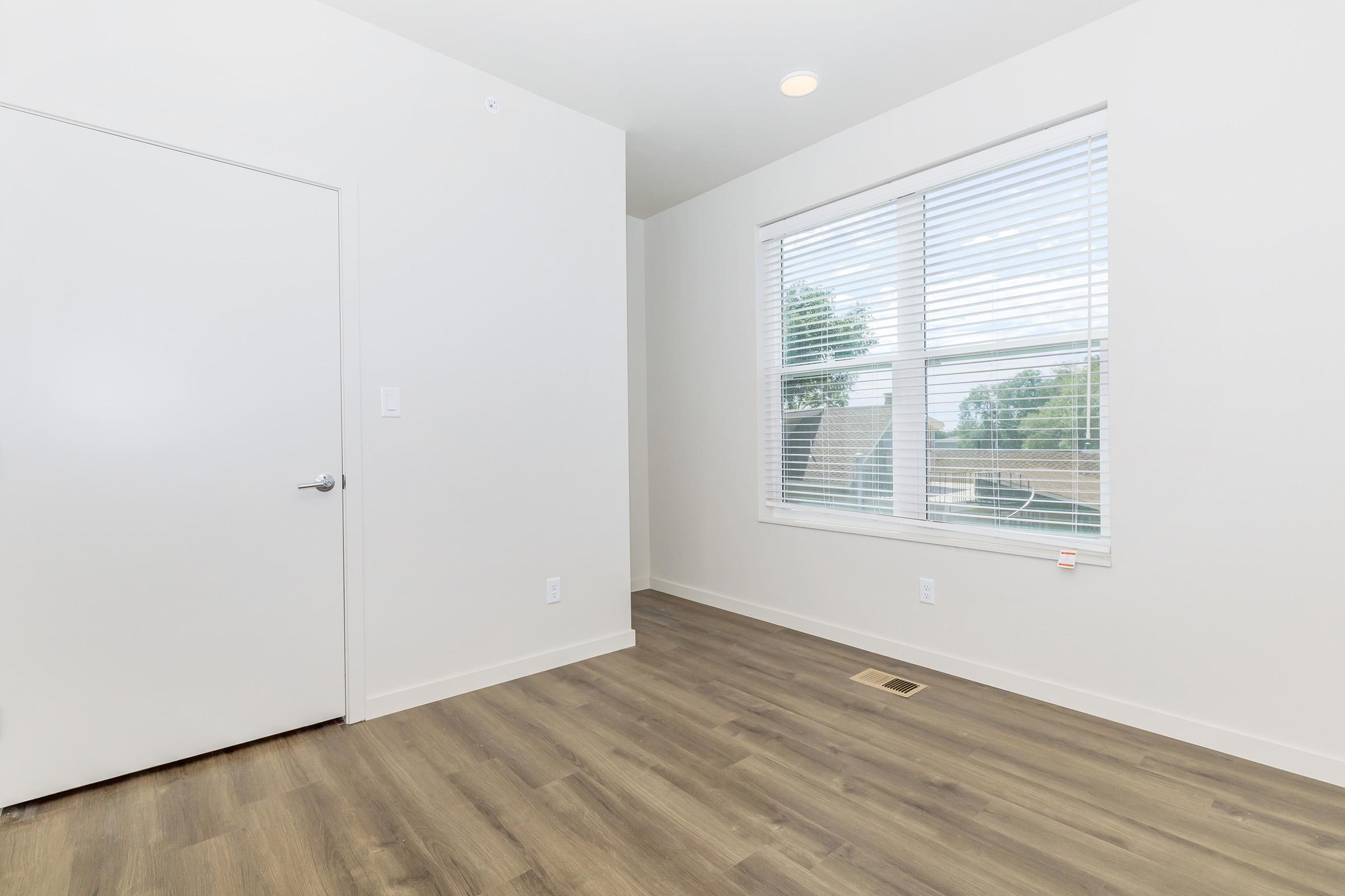 a kitchen with a large window