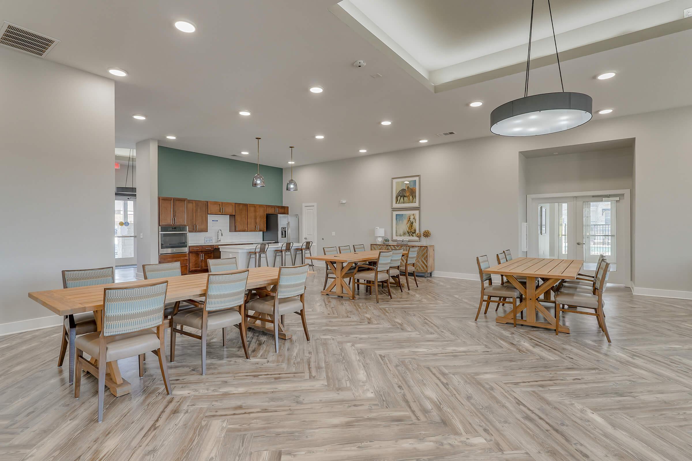 a room filled with furniture on top of a wooden table
