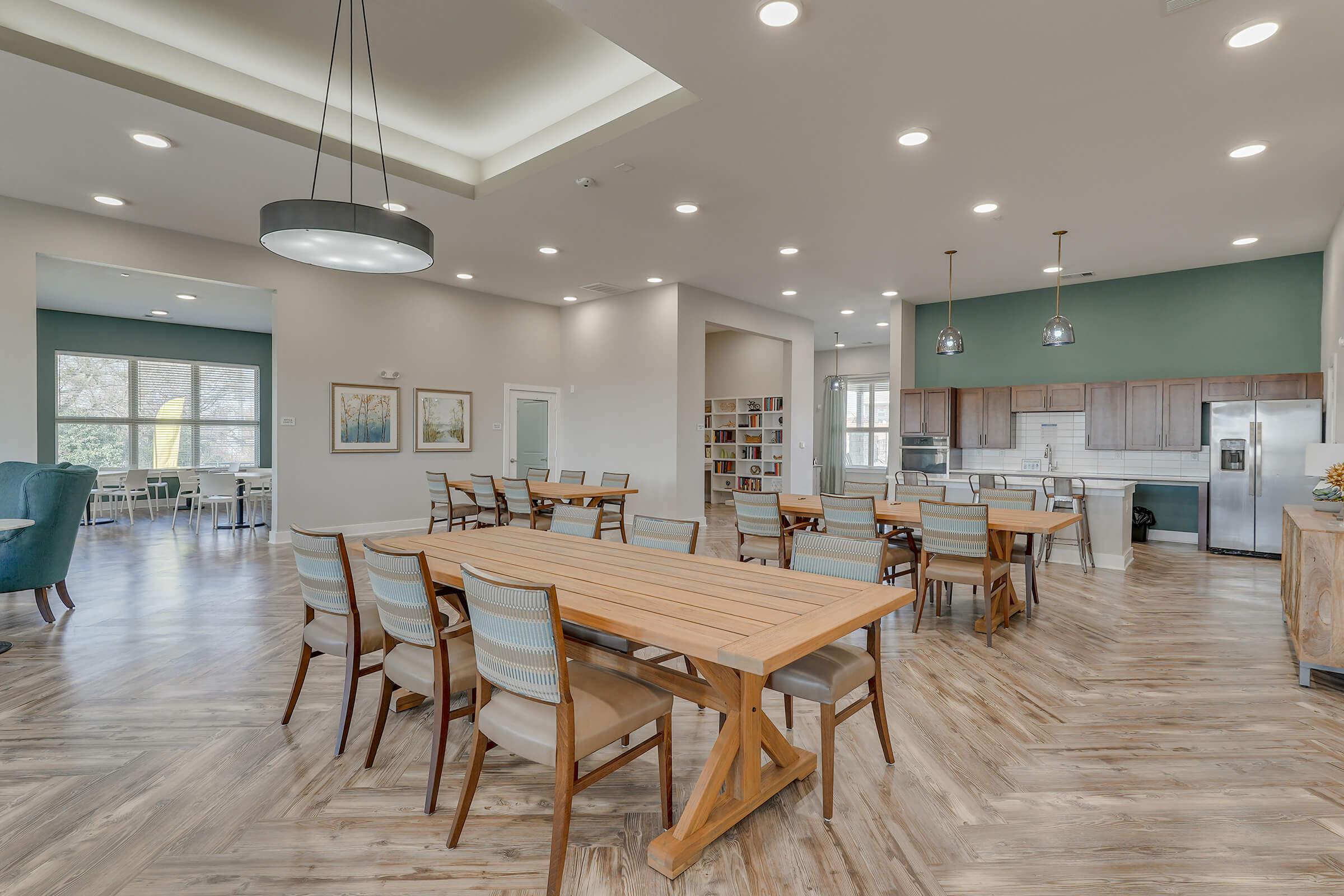 a room filled with furniture on top of a wooden table