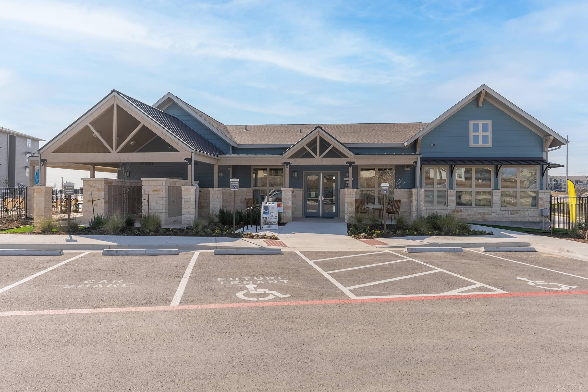 a small house in a parking lot
