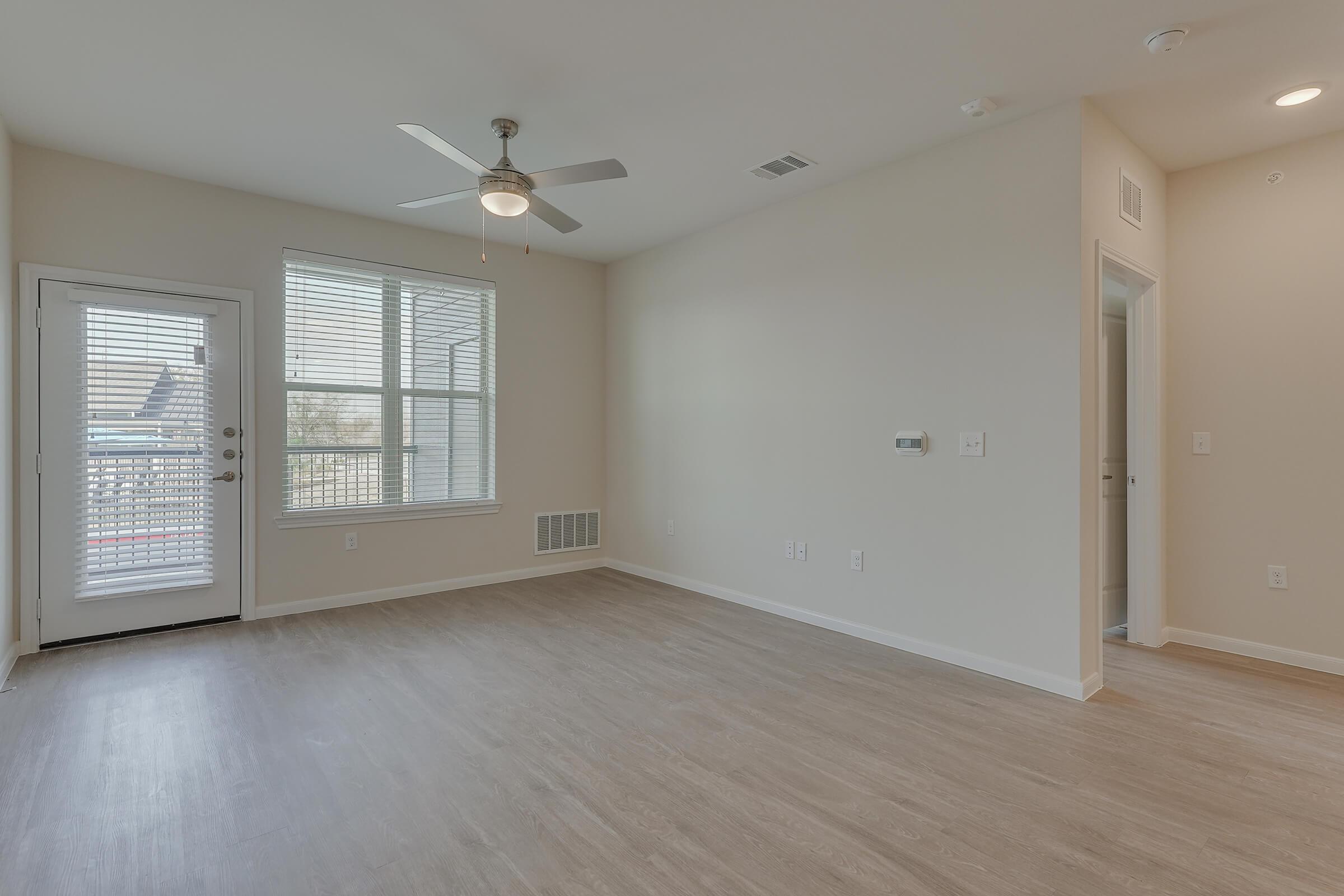 Apartments in Pflugerville TX - Modern Living With Hardwood Flooring and Access to Outdoor Patio