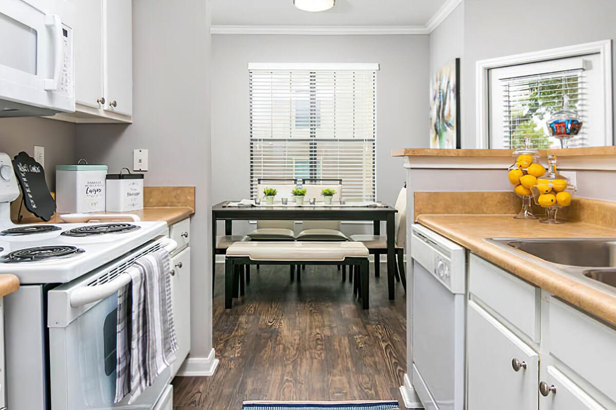 a kitchen with a sink and a window