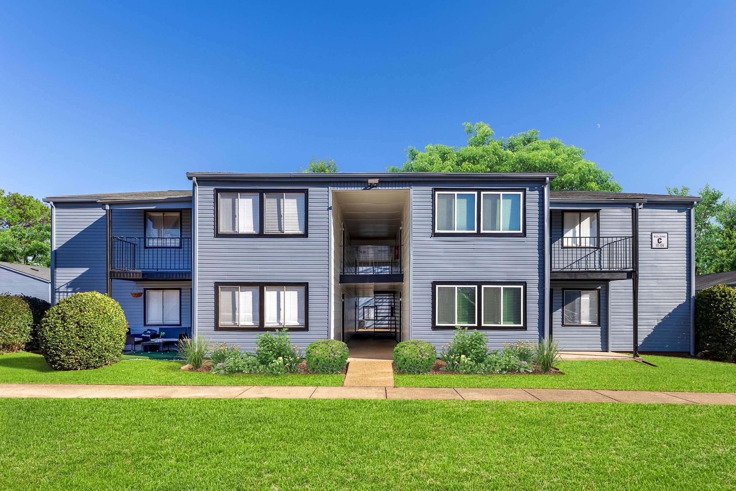 a large lawn in front of a house