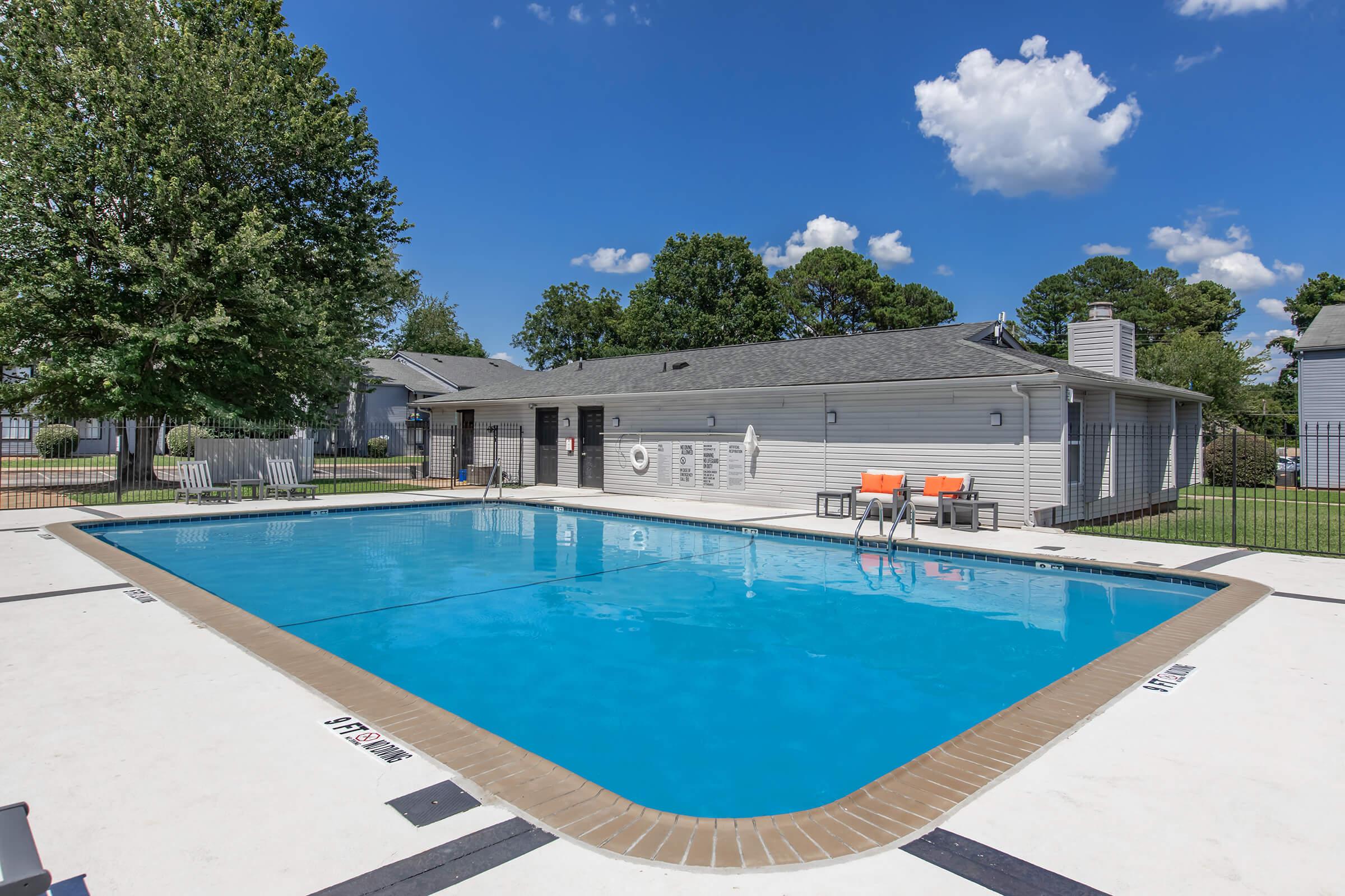 a pool next to a body of water