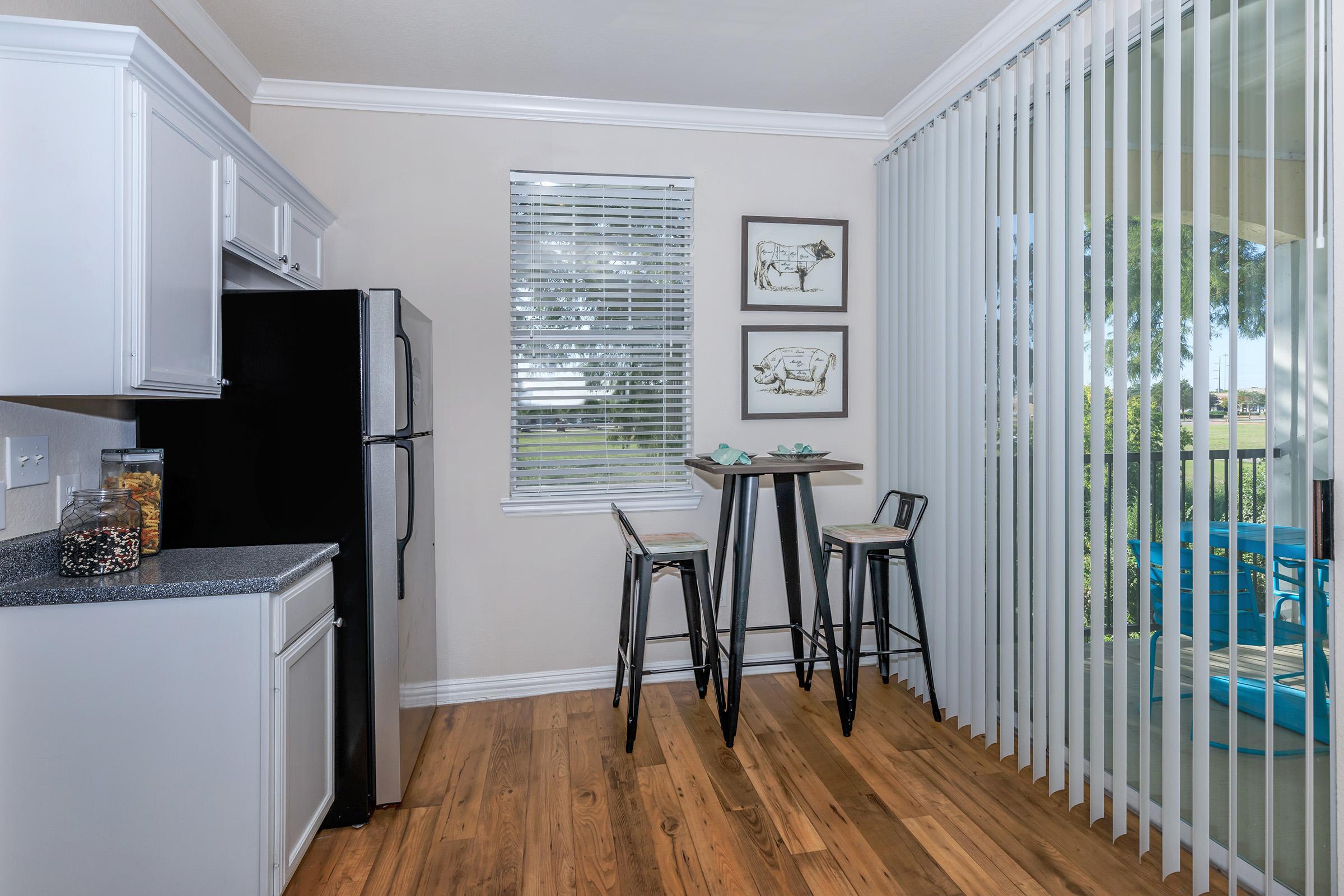 kitchen with sliding glass door to balcony