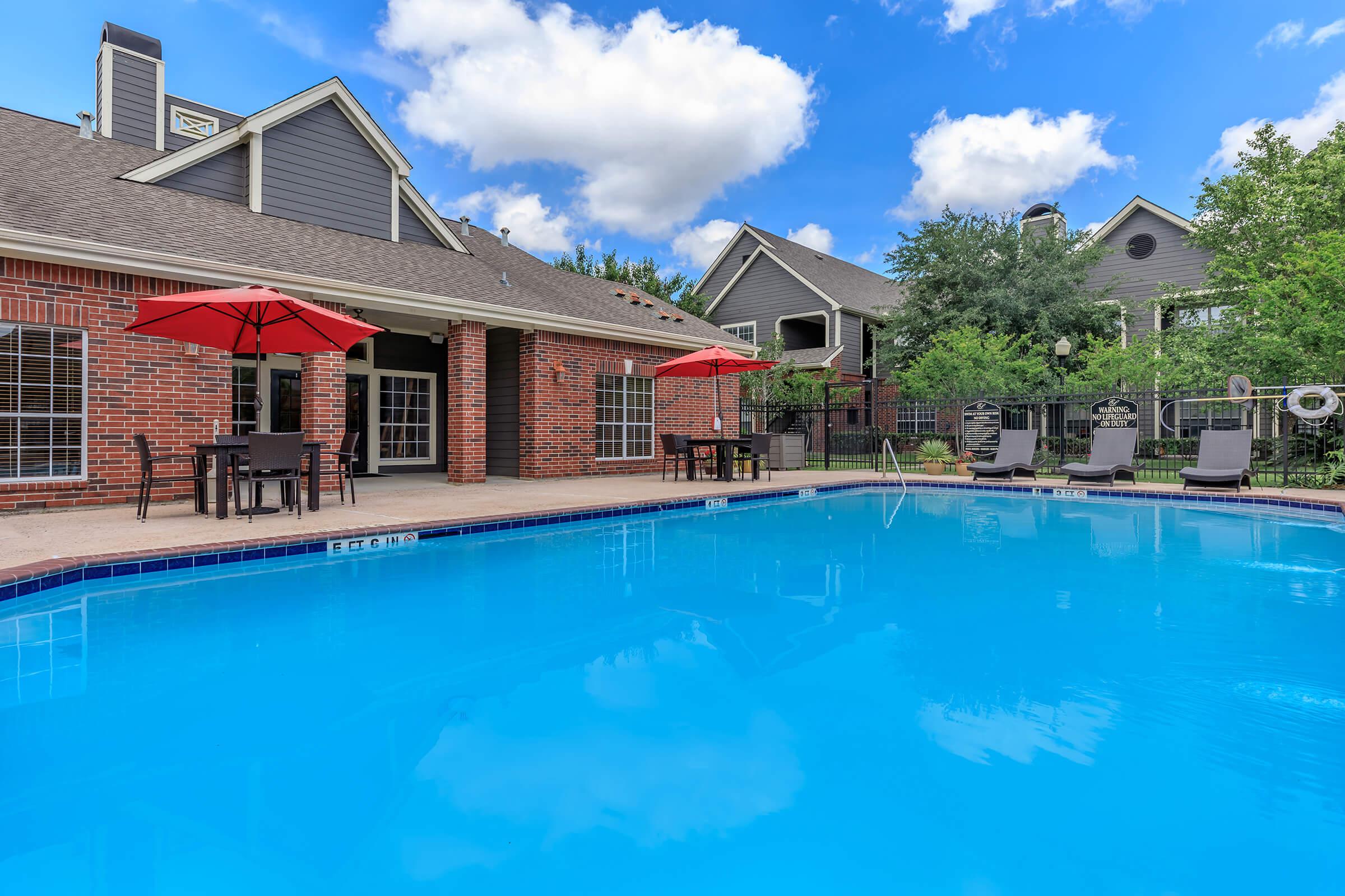 a house with a large pool of water