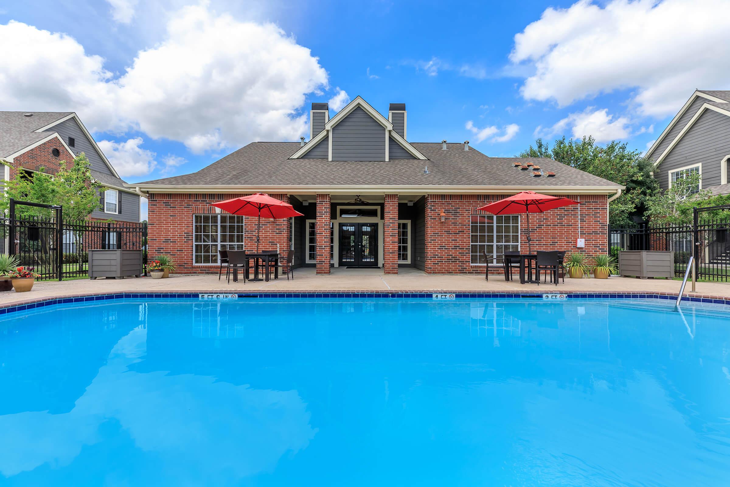 a house with a large pool of water