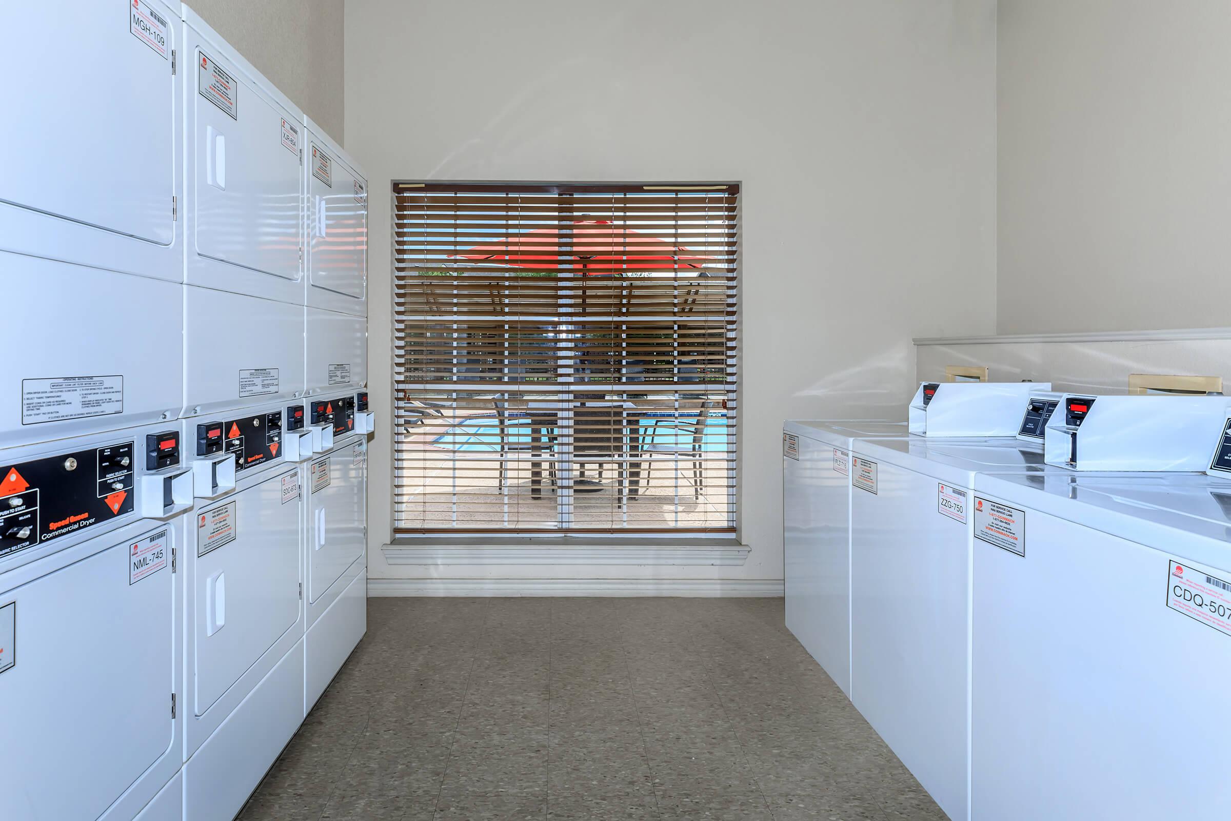 a large white refrigerator in a room