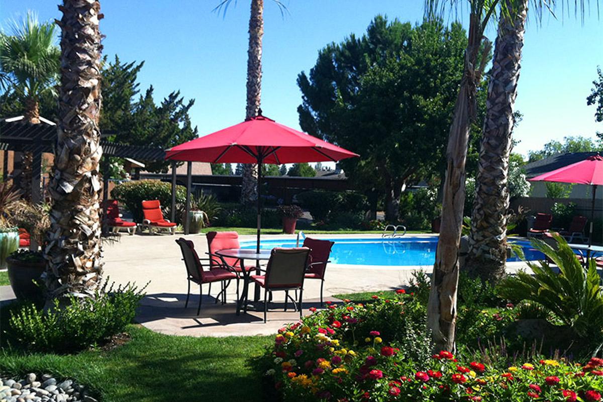 Relax beside the pool at Providence Pointe