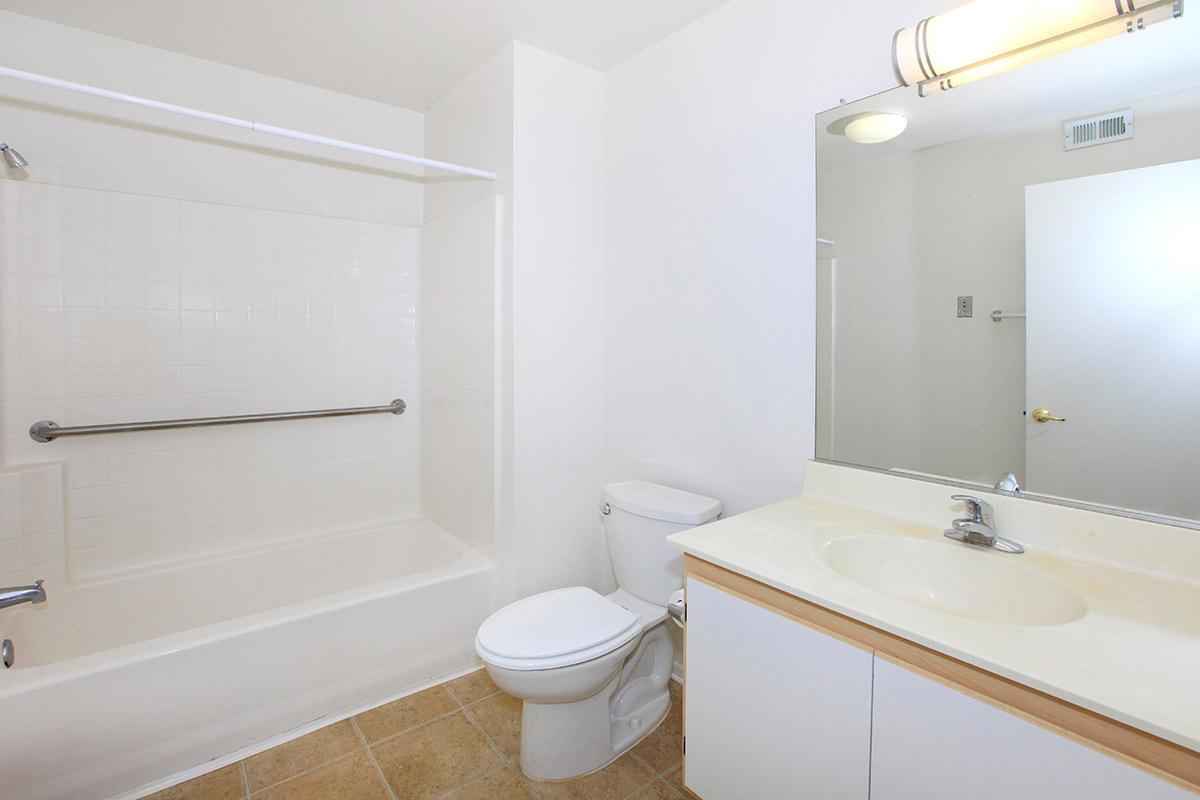 Bathroom with white cabinets