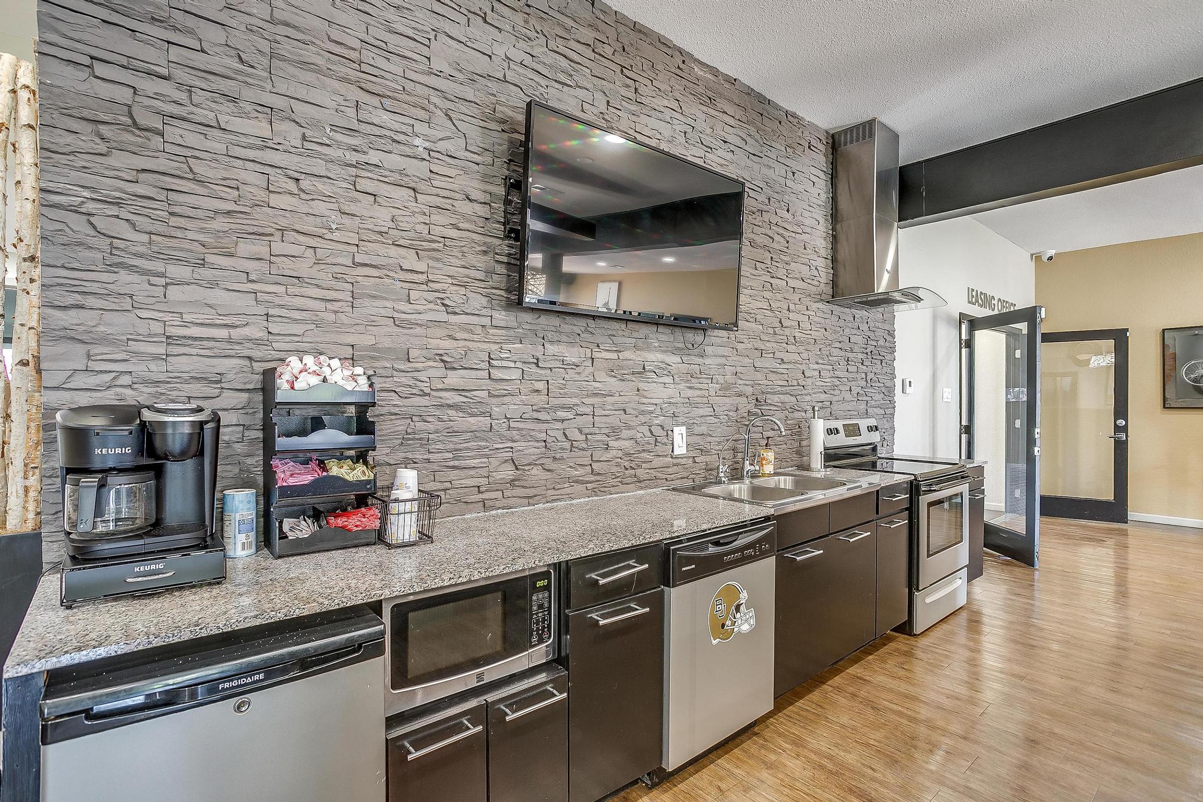 a kitchen with stainless steel appliances