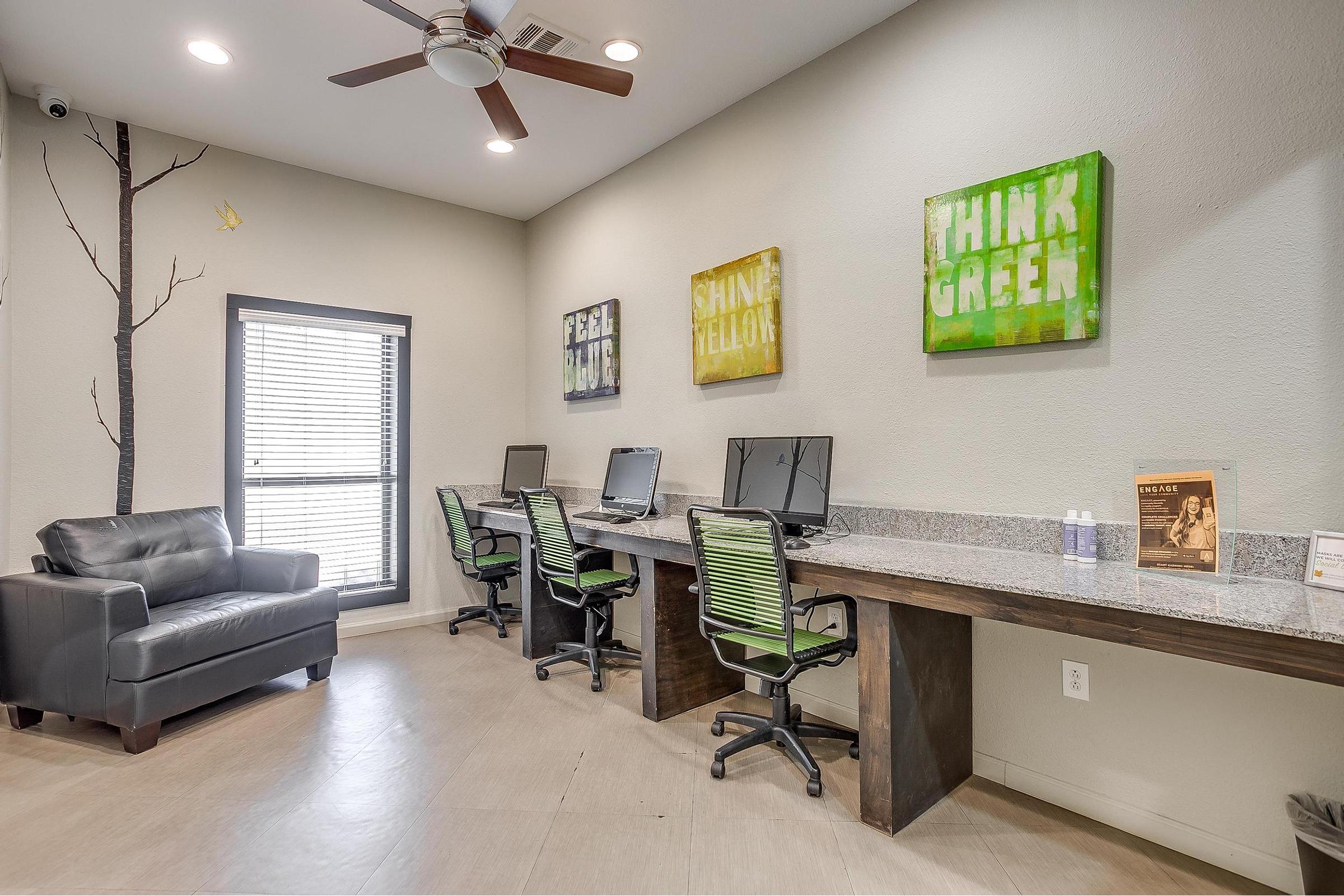 a living room filled with furniture and a tv