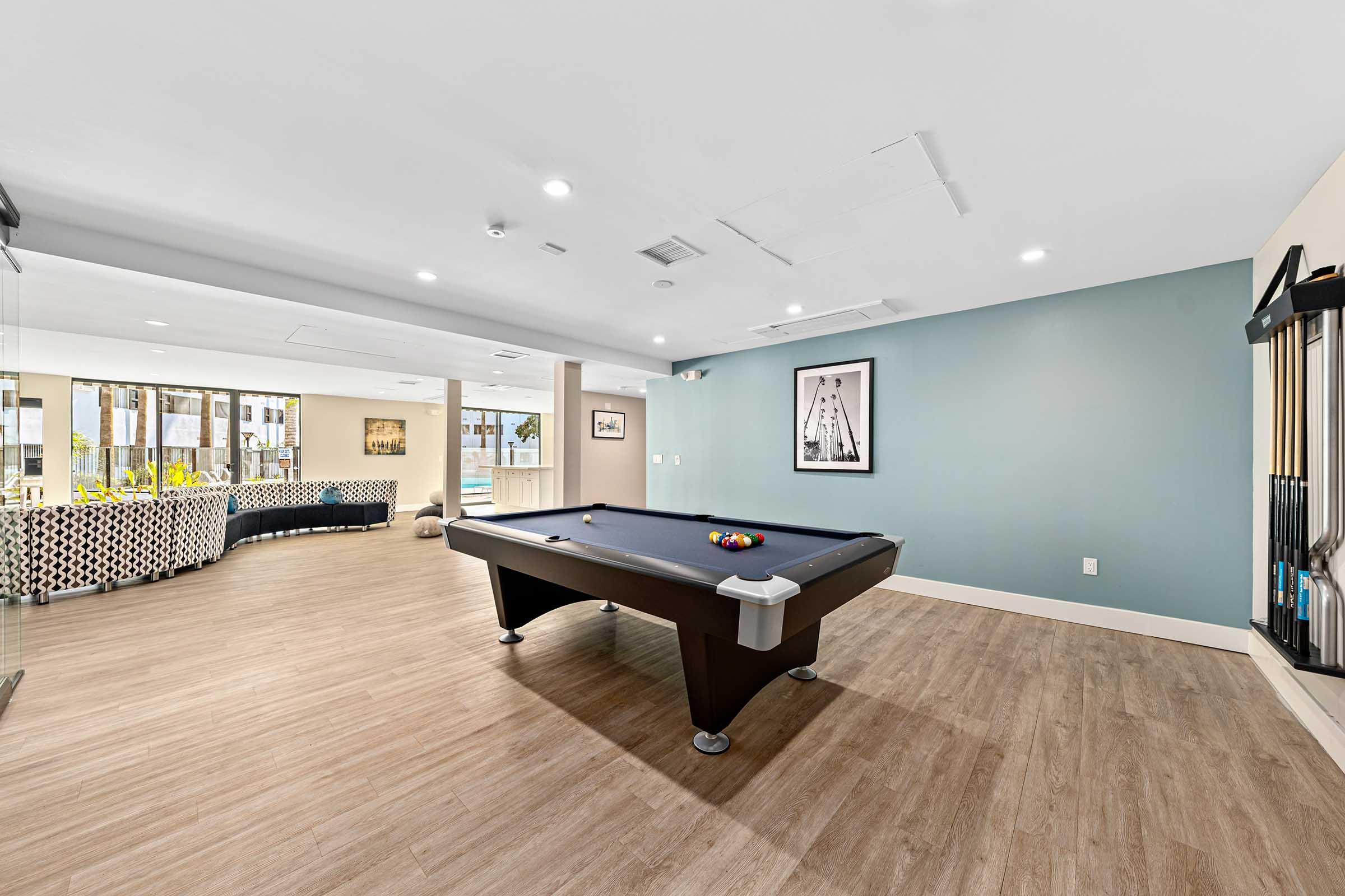 a large room with a pool table