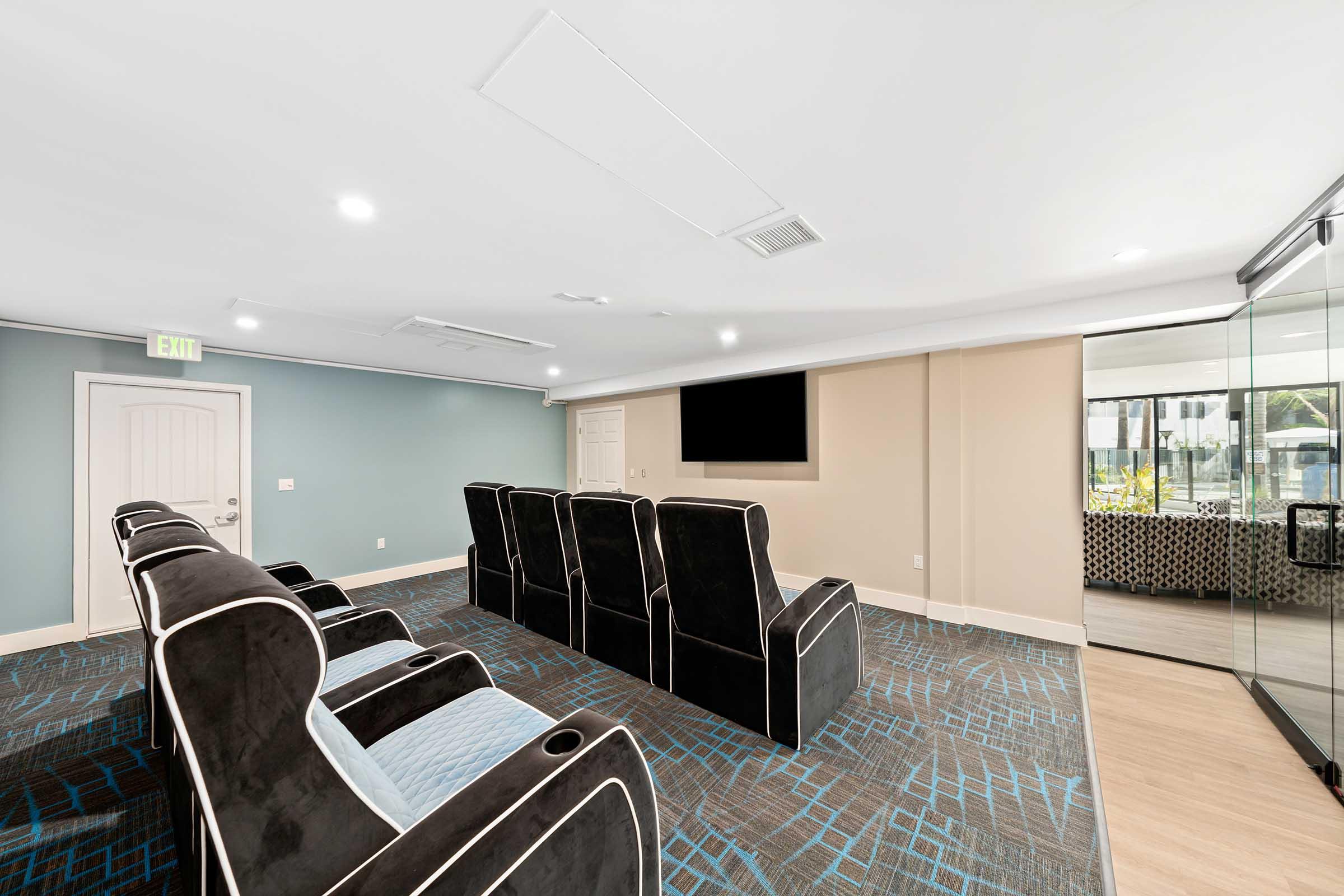 a theater room with seating