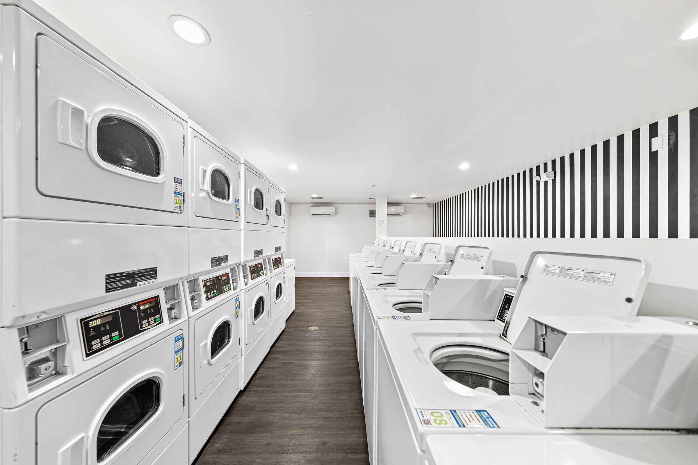 washers and dryers in a laundry room