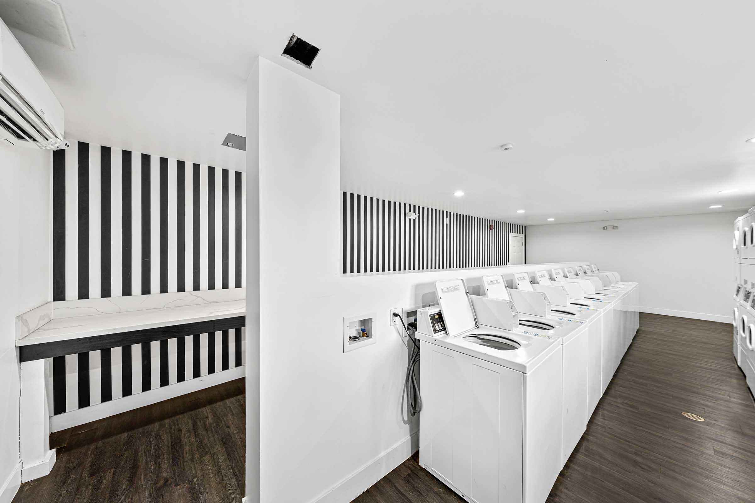 a laundry room with shelves