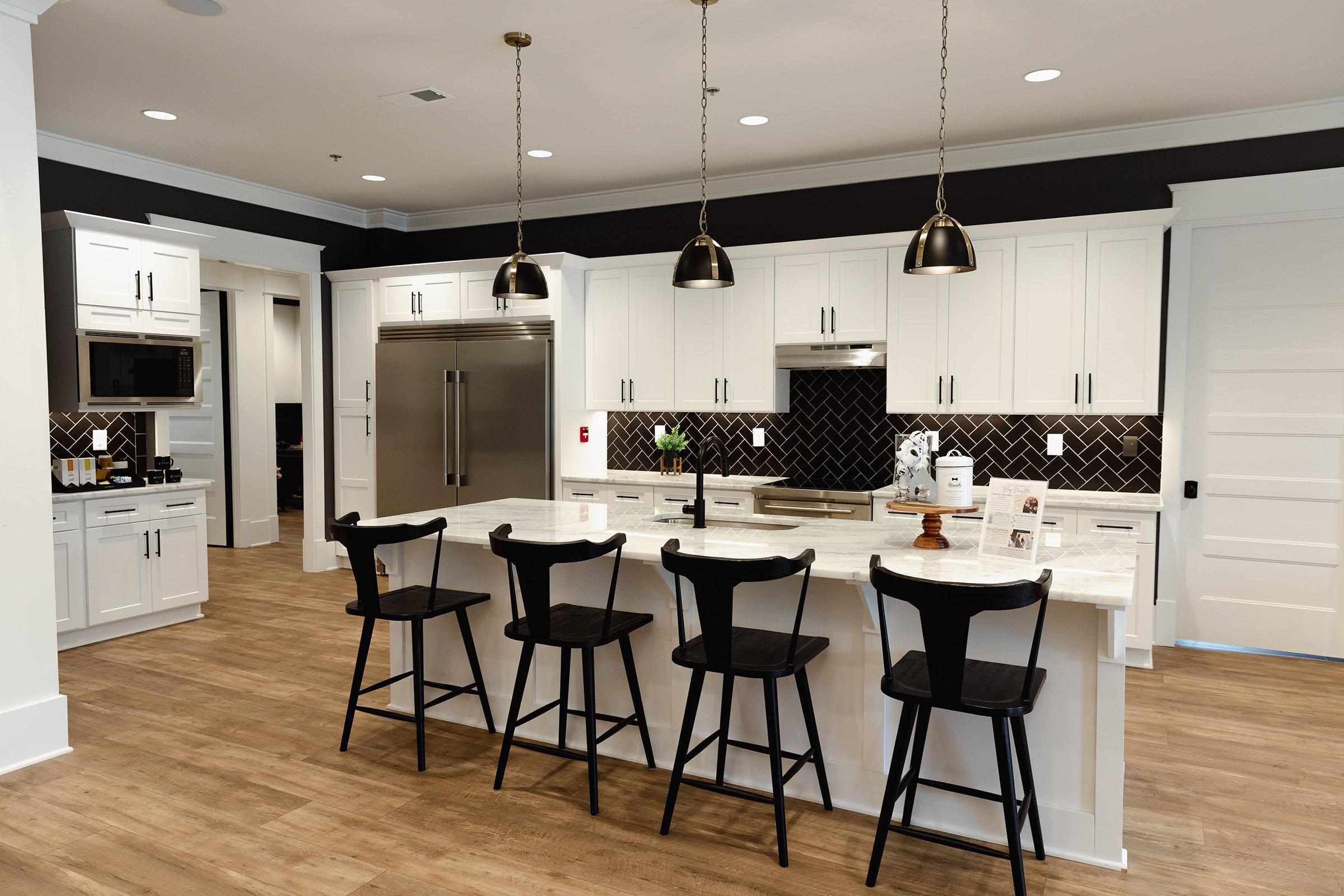 a kitchen with a table in a room