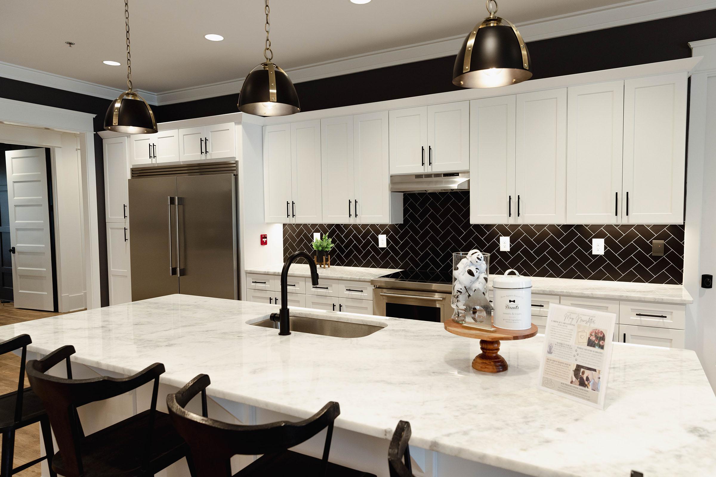 a kitchen with a dining room table