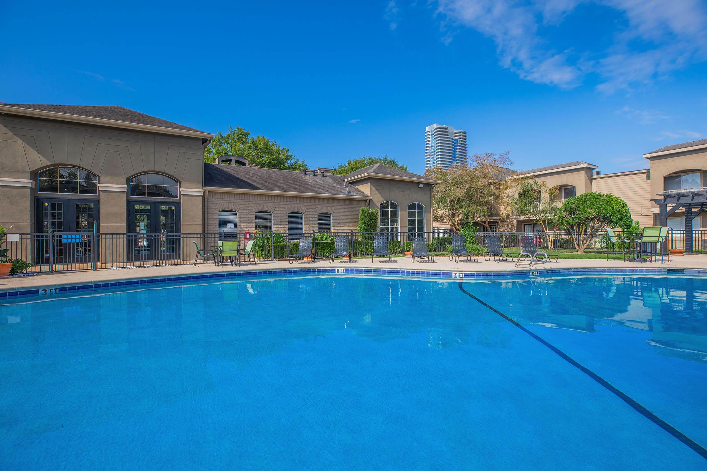 a large pool of water in front of a building