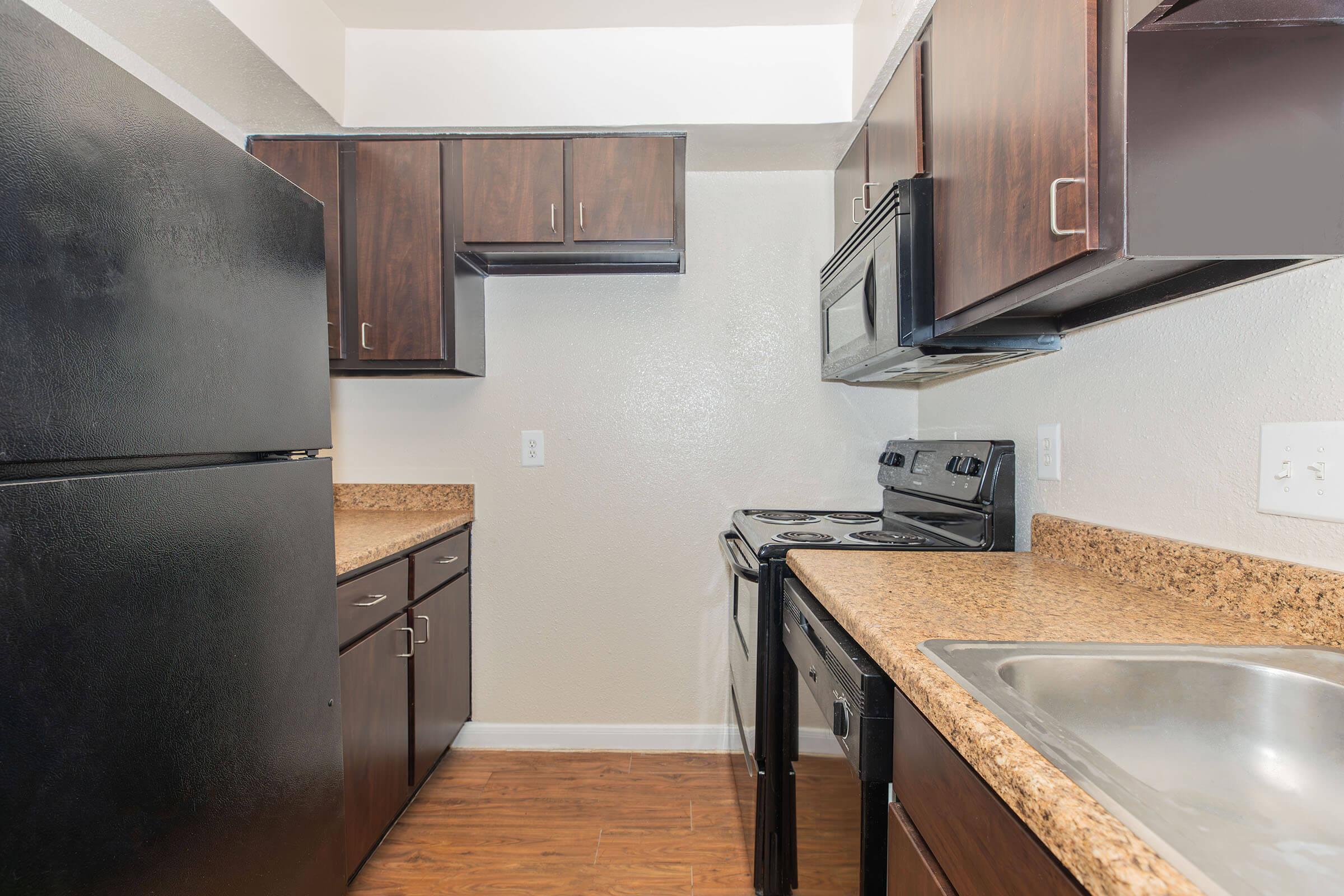 a modern kitchen with stainless steel appliances