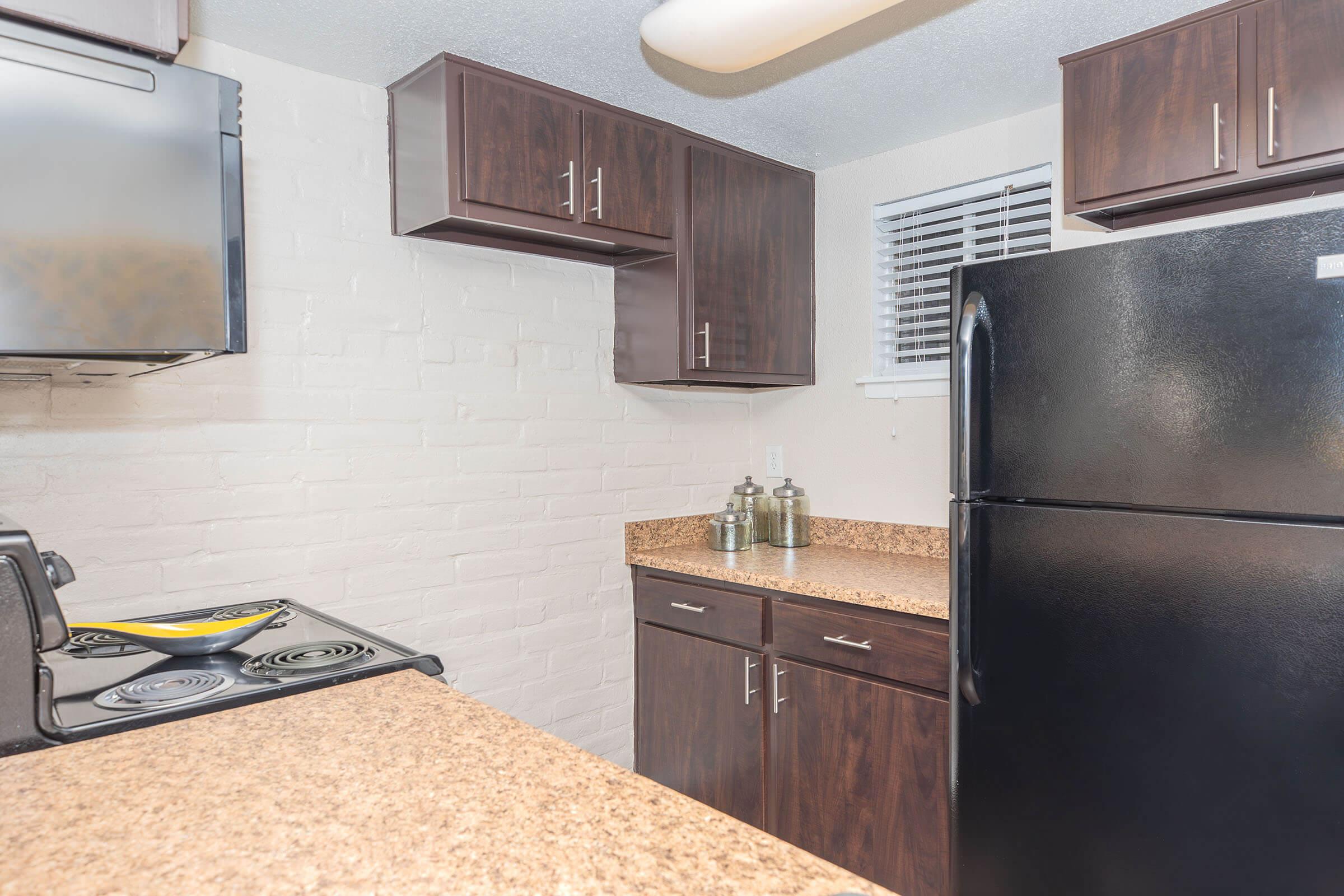 a stainless steel refrigerator in a kitchen