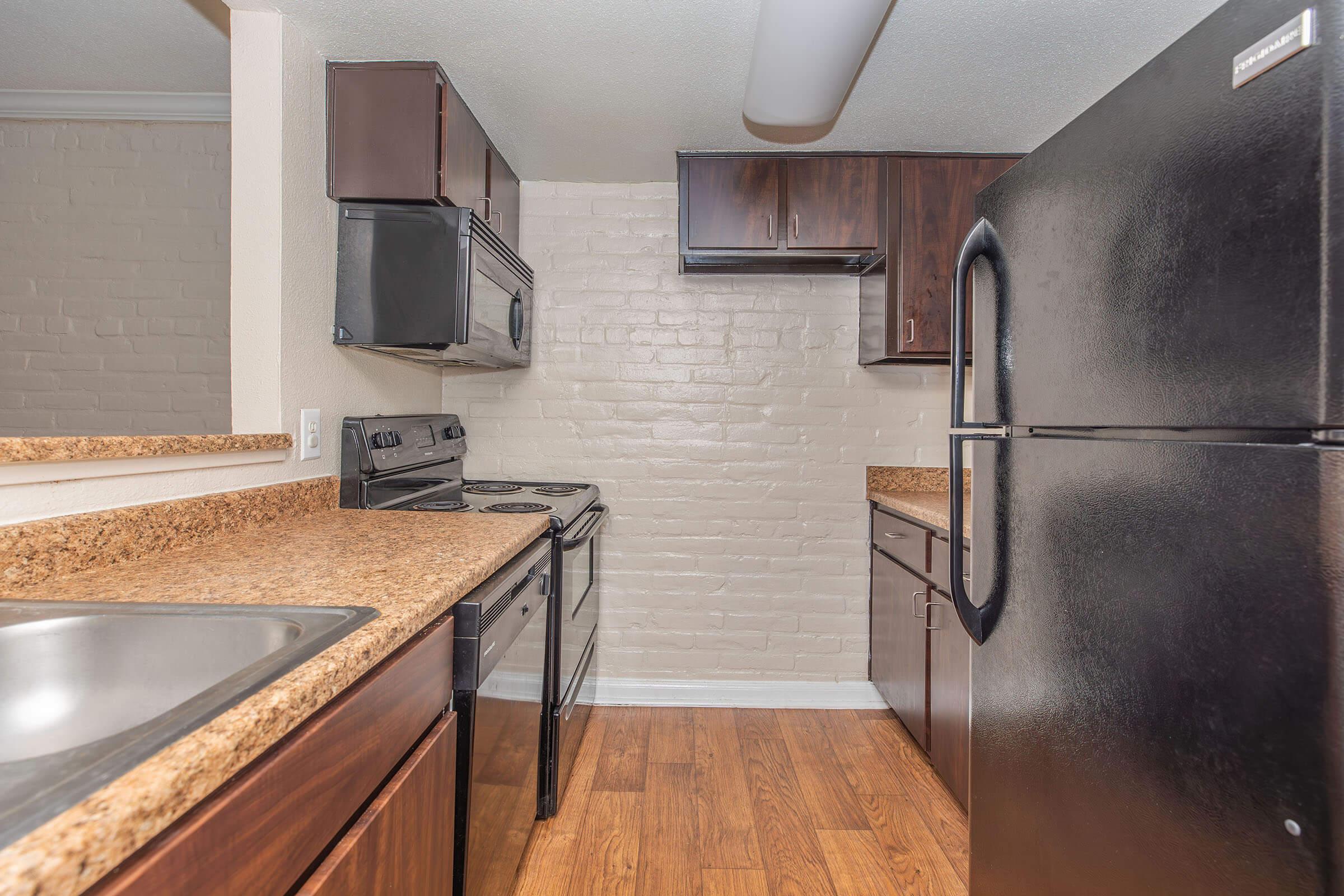 a modern kitchen with stainless steel appliances