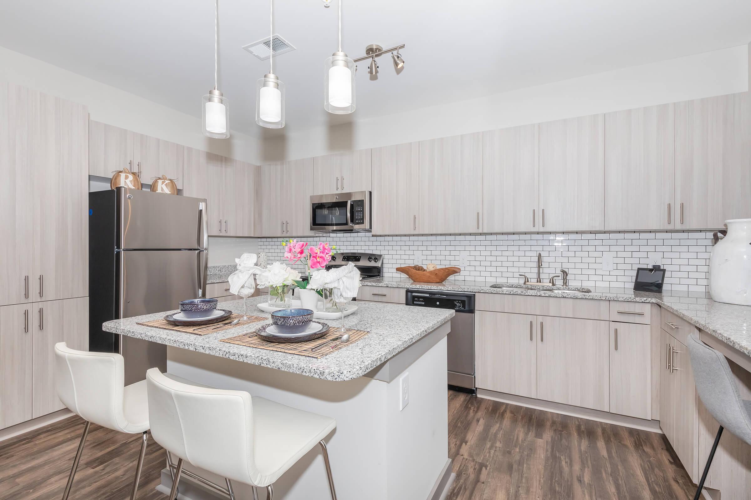 a kitchen with a sink and a counter
